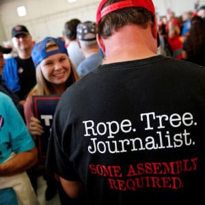 A man wears a shirt reading "Rope. Tree. Journalist." as supporters gather to rally with Republican presidential nominee Donald Trump in a cargo hangar at Minneapolis Saint Paul International Airport in Minneapolis, Minnesota, U.S. November 6, 2016. (Jonathan Ernst/Reuters)