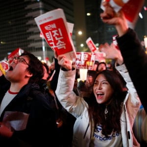 People chant slogans as they march toward the Presidential Blue House during a protest calling South Korean President Park Geun-hye to step down in Seoul, South Korea, November 19, 2016. (Kim Hong-Ji/Reuters)