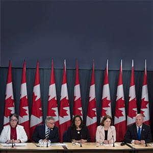 Minister of National Revenue Diane Lebouthillier, Ralph Goodale, Minister of Public Safety and Emergency Preparedness, Jody Wilson-Raybould, Minister of Justice and Attorney General of Canada, Jane Philpott, Minister of Health listen as Parliamentary Secretary Bill Blair responds to a question after announcing the legalization of marijuana during a news conference in Ottawa, Thursday April 13, 2017. (Adrian Wyld/CP)