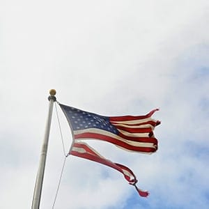 Tattered American Flag After Hurricane Sandy. (Education Images/UIG/Getty Images)