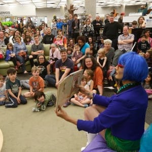 Pharaoh Moans reads to children and parents at the Millennium Library in Winnipeg Saturday, May 20, 2017. Winnipeg Public Library hosted Read by Queens, a family storytime event with stories read and performed by local drag queens on May 20, 2017. (Photograph by John Woods)