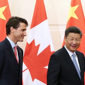 Chinese President Xi Jinping (R) gestures to Canadian Prime Minister Justin Trudeau ahead of their meeting at the Diaoyutai State Guesthouse in Beijing, China August 31, 2016. REUTERS/Wu Hong/Pool - RTX2NPOB