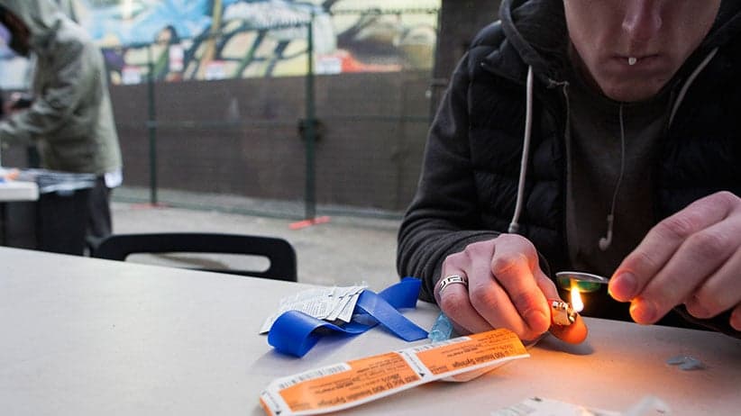 A drug user at a popup safe injection tent in Vancouver.