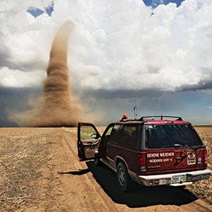08 May 2008, Kansas, USA --- Storm Chasers Monitoring Approaching Tornado in Western Kansas --- Image by © Jim Reed/Jim Reed Photography - Severe & /Corbis