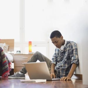 Student using laptop at home. (Hero Images/Getty Images)