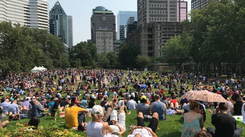 McGill campus students taking in the eclipse. (Laurie Devine/McGill University)