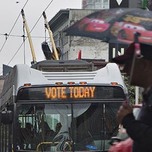 A transit bus reminding people to vote travels in downtown Vancouver, British Columbia, October 19, 2015. Canadians looked set for political change on Monday as polls showed a strong prospect that Conservative Prime Minister Stephen Harper's government will be ousted, or reduced to a minority, amid a late surge by Liberal rival Justin Trudeau. (Andy Clark/Reuters)