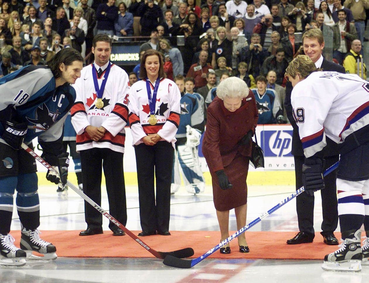 Queen Elizabeth II drops the puck at a Vancouver Canucks game