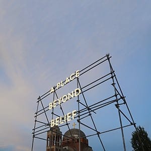 Nathan Coley's installation of "A Place Beyond Belief", 2012. Installation, National Gallery of Kosovo, Pristina. (Studio Nathan Coley)