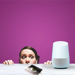 Someone cowers from their tablet smart home device.