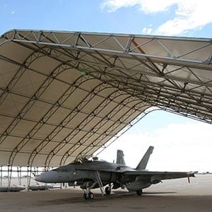 EL CENTRO, CA - NOVEMBER 4: CF-18 Hornet fighter jets belonging to the Canadian 410 'Couger' Squadron are seen under shelters on the tarmac at Naval Air Facility (NAF) El Centro on November 4, 2009 near El Centro, California. The annual Canadian fighter pilot courses in the US train approximately 20-22 Canadian fighter pilots based in 4 Wing - Cold Lake, Alberta. The seven month long courses comprised of academics, simulator flights and flying missions in the southern California desert. The Canadian military courses are held in California for the better weather and the large nu,ber of bombing ranges and target sets in the region. (Photo by David McNew/Getty Images)