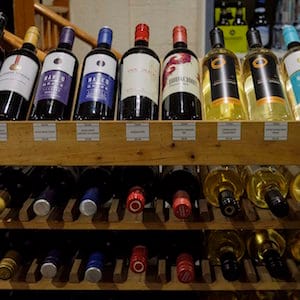 Bottles of British Columbia wine on display at a liquor store in Cremona, Alta., Wednesday, Feb. 7, 2018. Alberta is banning the import of British Columbia wines in response to what Alberta Premier Rachel Notley sees as moves to try to scuttle the Trans Mountain pipeline project. THE CANADIAN PRESS/Jeff McIntosh