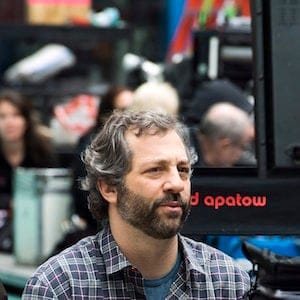 Producer Judd Apatow watches a monitor while filming "Anchorman: The Legend Continues" on Saturday, May 18, 2013 in New York. (Photo by Charles Sykes/Invision/AP)