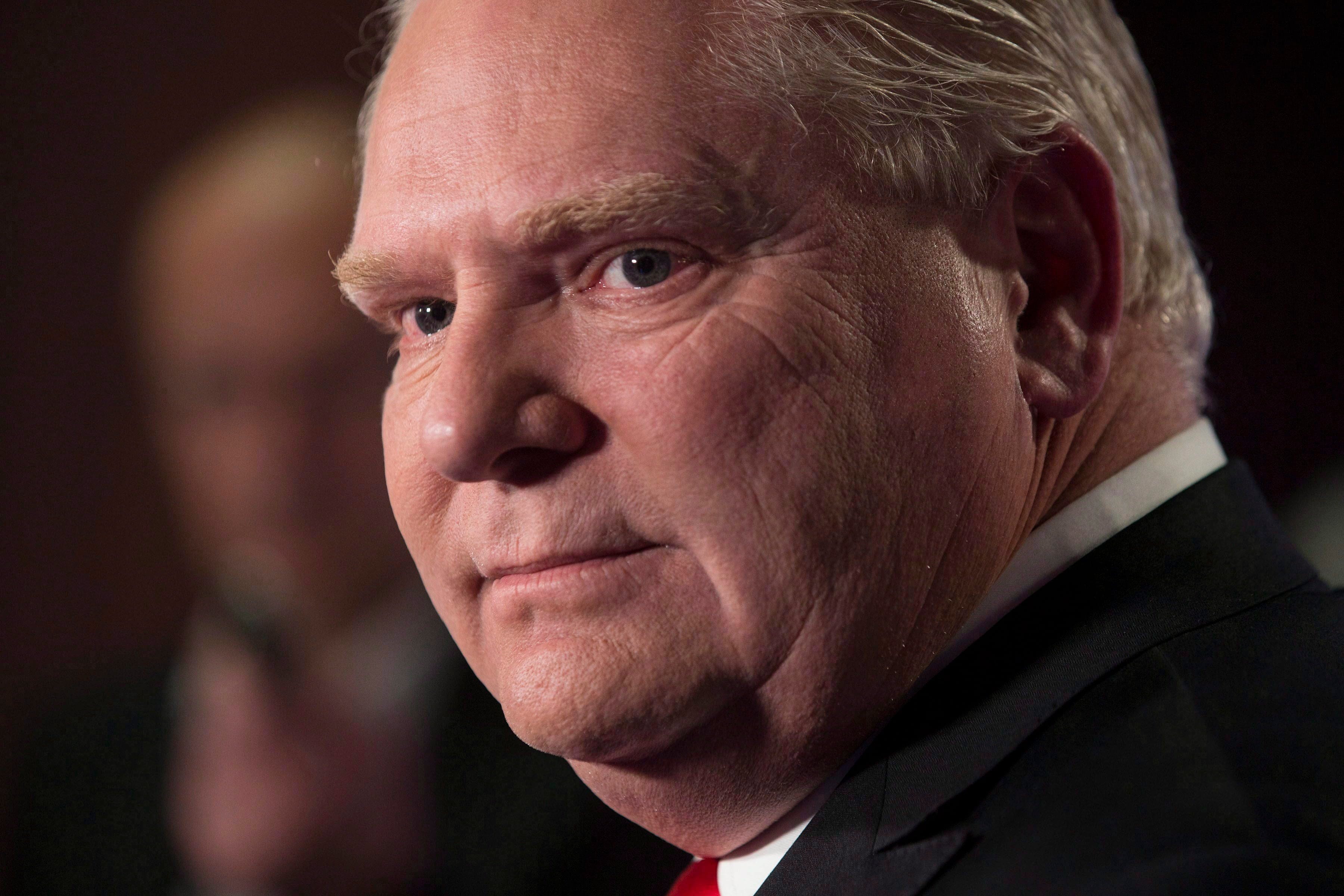 PC Ontario Leadership candidate Doug Ford scrums with journalists at the TVO studios in Toronto on Thursday, Feb. 15, 2018, following a televised debate. (THE CANADIAN PRESS/Chris Young)