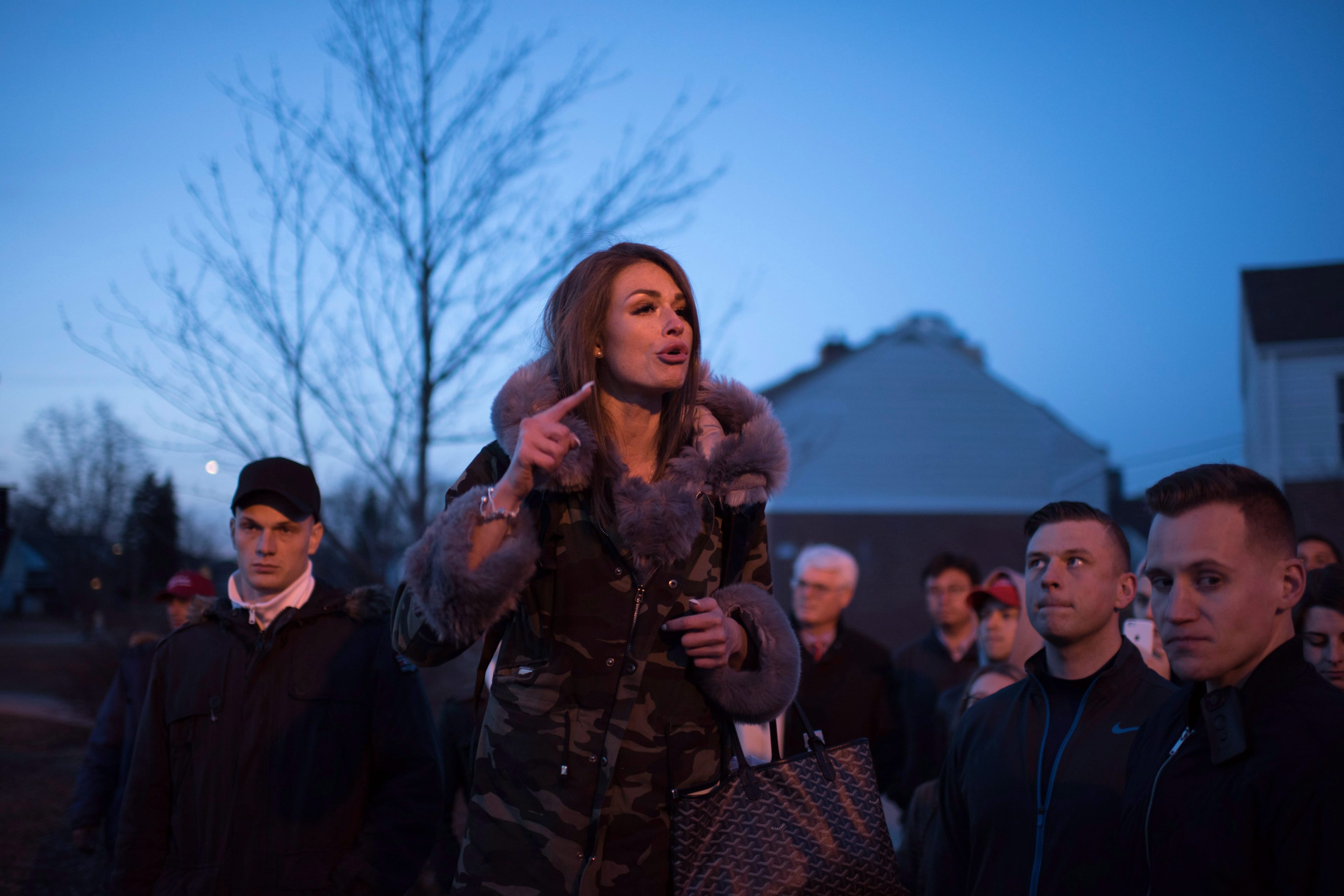 Faith Goldy, who was supposed to speak at Wilfrid Laurier University but was interrupted by a fire alarm, speaks outside the university on Tuesday, March 20, 2018. (THE CANADIAN PRESS/Hannah Yoon)