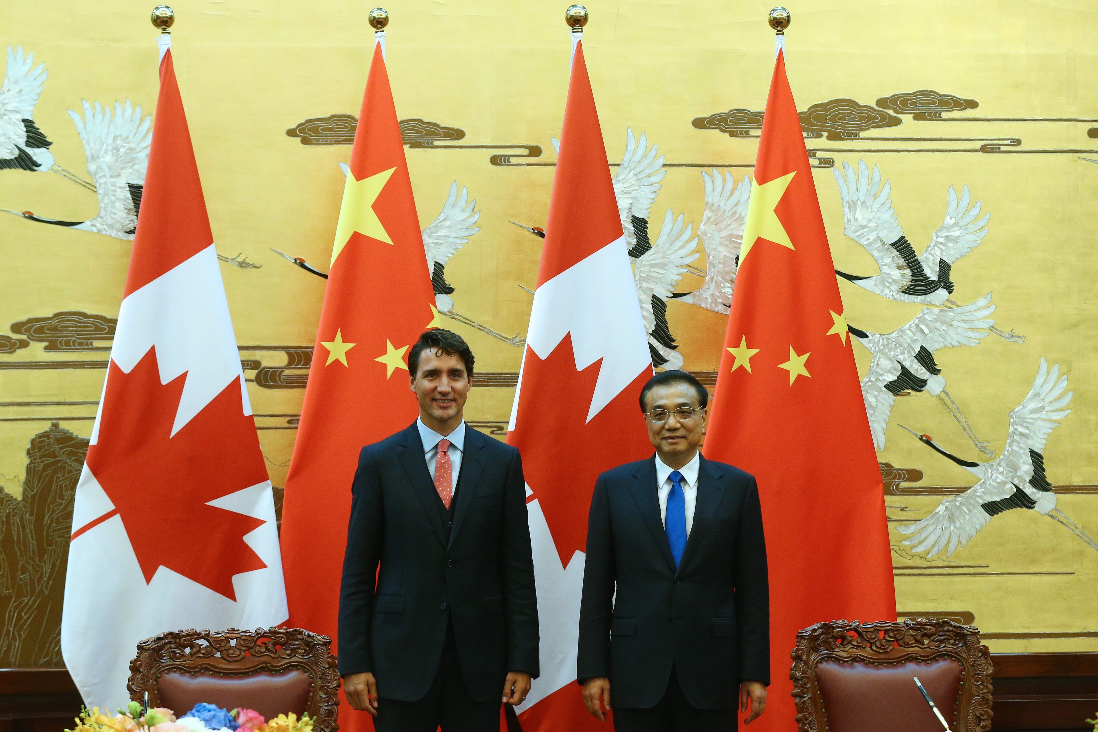 Chinese Premier Li Keqiang and Prime Minister Justin Trudeau pose after a meeting at the Great Hall of the People in Beijing, China, on Aug. 31, 2016. (Photo by Wu Hong - Pool/Getty Images)