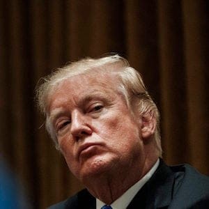 President Donald Trump pauses during a meeting in the Cabinet Room of the White House, in Washington, Wednesday, Feb. 28, 2018, with members of congress to discuss school and community safety. (AP Photo/Carolyn Kaster)