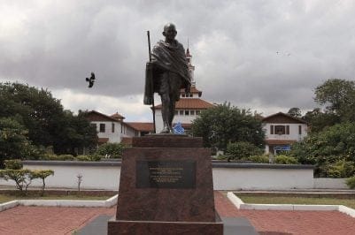 FILE-In this Thursday, Sept. 22, 2016 file photo, a statue of Indian independence leader Mohandas Gandhi in Accra, Ghana, Ghana has expressed its intention to remove a statue of Indian independence leader Mohandas Gandhi from a university in the capital, citing a controversy over what critics call his Äúracist identity.Äù (AP Photo/Christian Thompson, File)