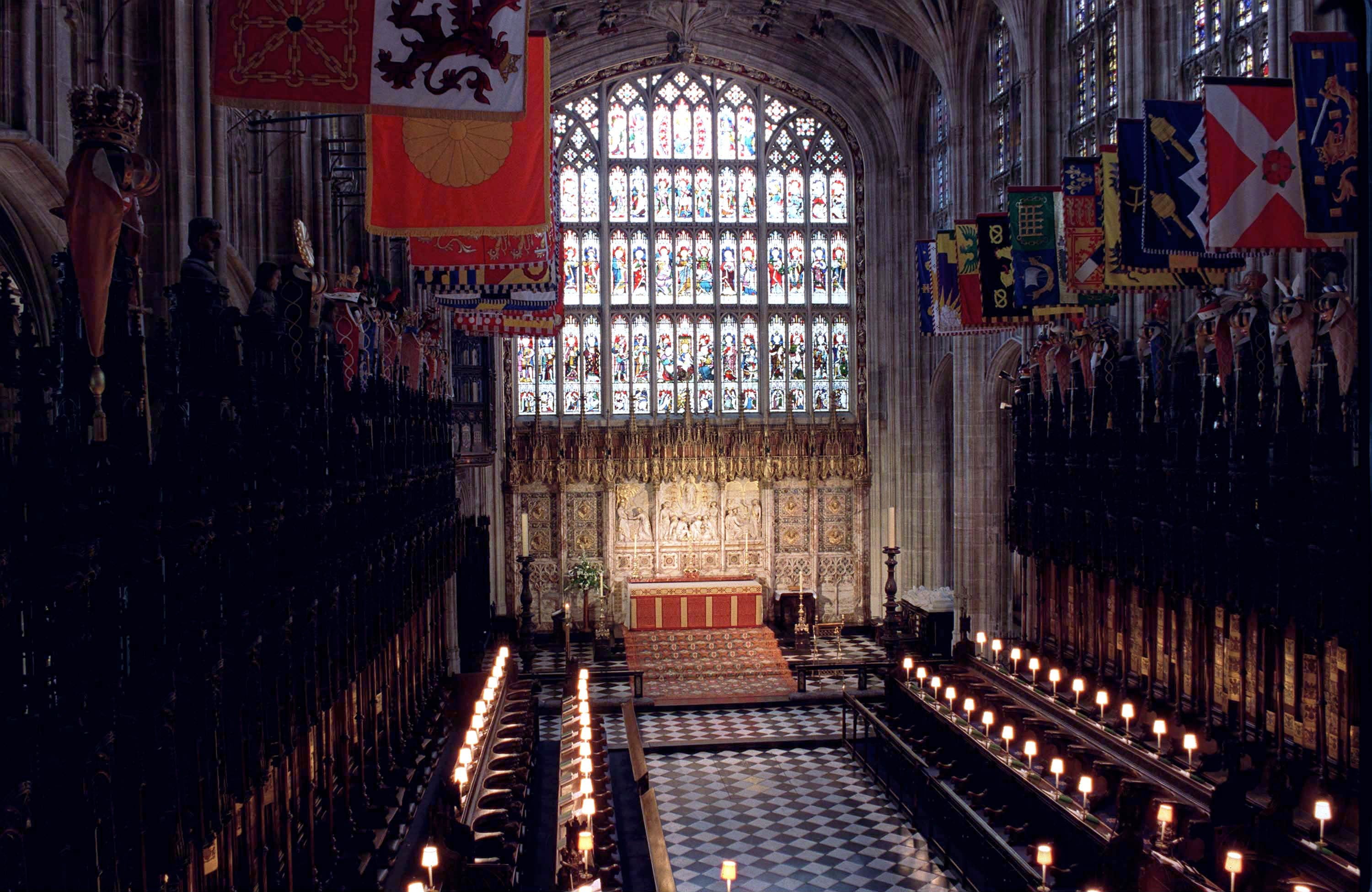 WINDSOR, UNITED KINGDOM - MAY 14: The Quire In St.george's Chapel. Above The Garter Stalls Hang The Banners Of The Knight Of The Garter, Below Which Are Displayed Their Crests, Helmets And Swords. The Wedding Of Prince Edward And Sophie Rhys-jones Took Place Here And The Royal Family Sat On The Right Hand Side. (Photo by Tim Graham/Getty Images)