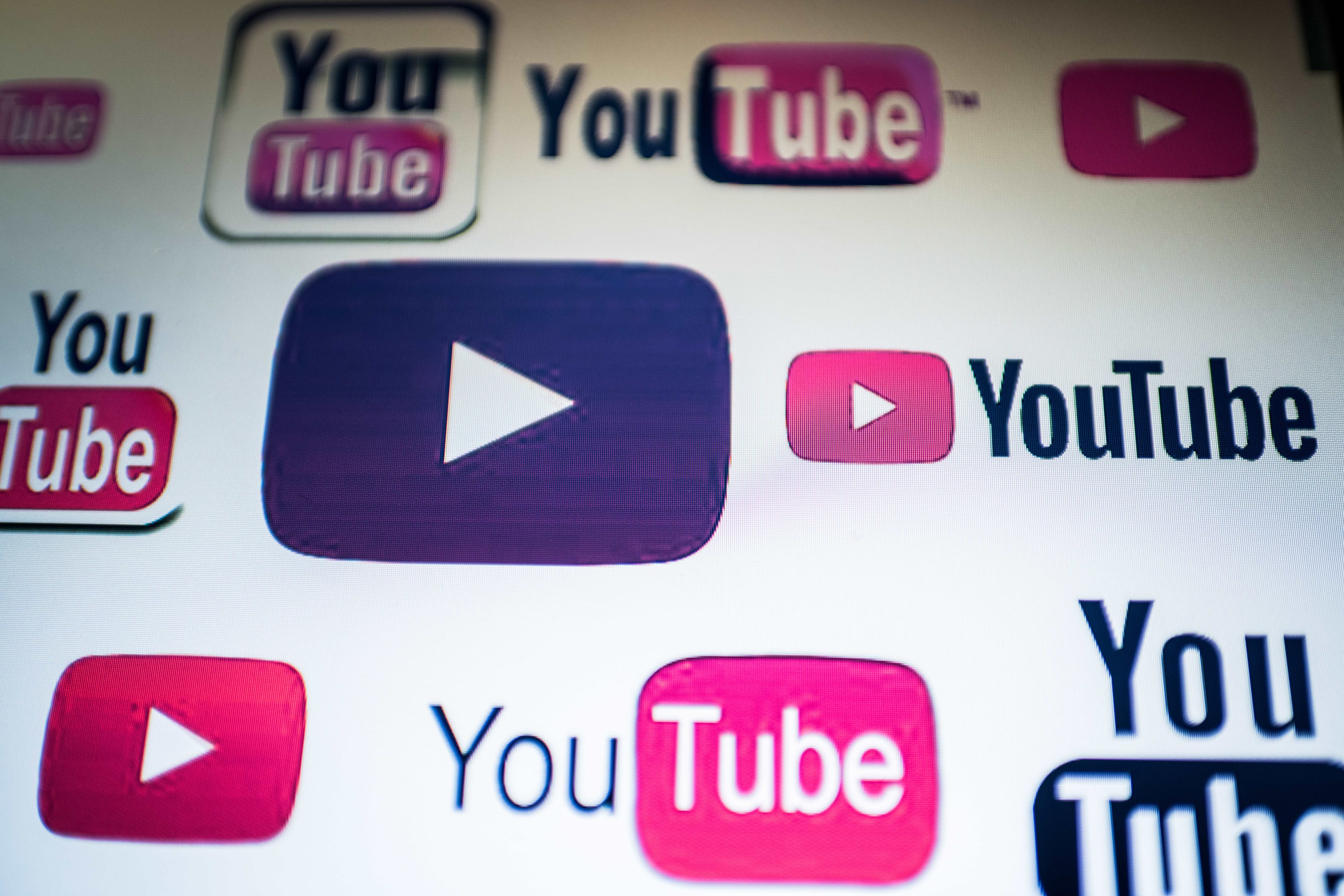 This photo illustration taken on March 23, 2018 shows YouTube logos on a computer screen in Beijing. / AFP PHOTO / NICOLAS ASFOURI (Photo credit should read NICOLAS ASFOURI/AFP/Getty Images)