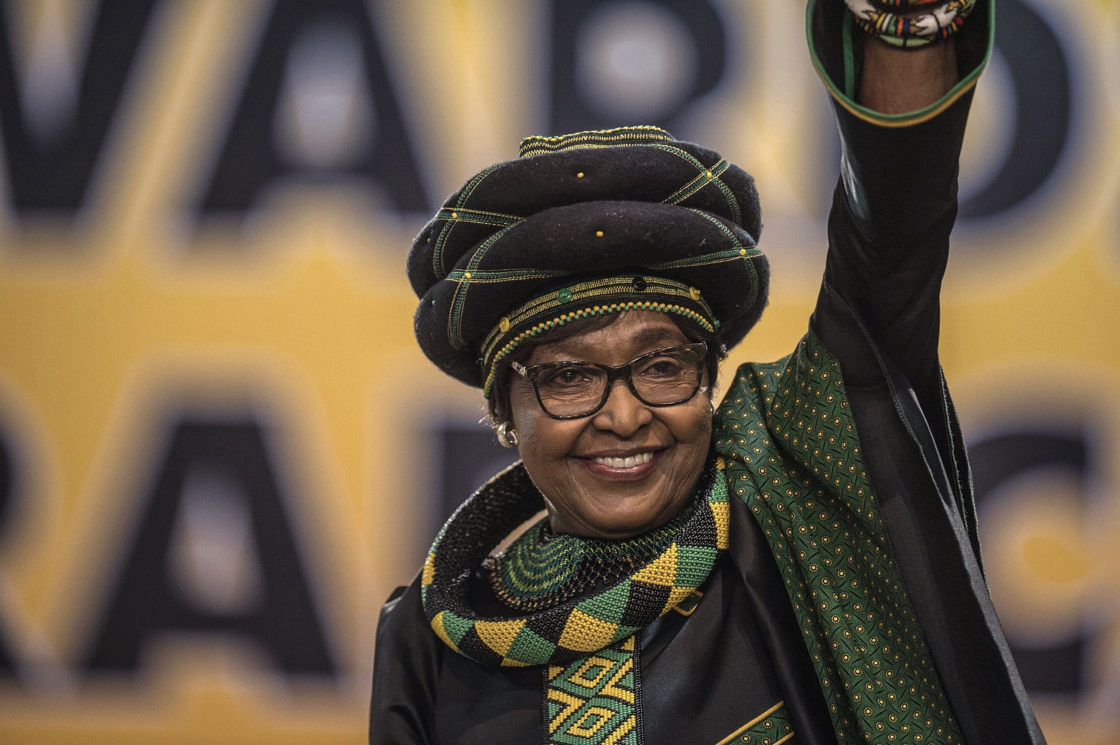 The former wife of the late South African President Nelson Mandela, anti-apartheid campaigner Winnie Mandela waves as she attends the 54th ANC National Conference at the NASREC Expo Centre in Johannesburg on December 16, 2017. (Mujahid Safodien/AFP/Getty Images)