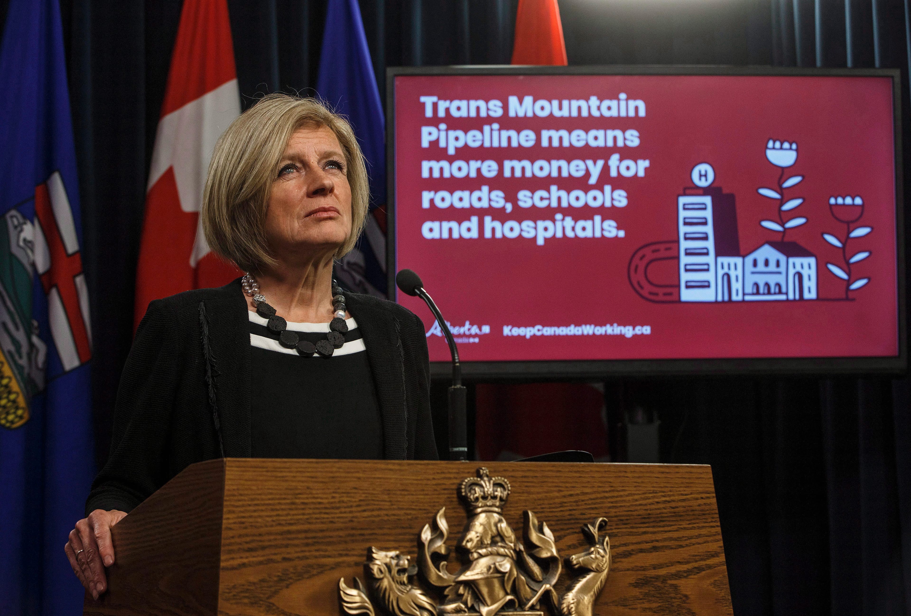 Alberta Premier Rachel Notley unveils an ad they will be running in B.C. about the pipeline expansion in Edmonton, Alta., on Thursday, May 10, 2018. (THE CANADIAN PRESS/Jason Franson)