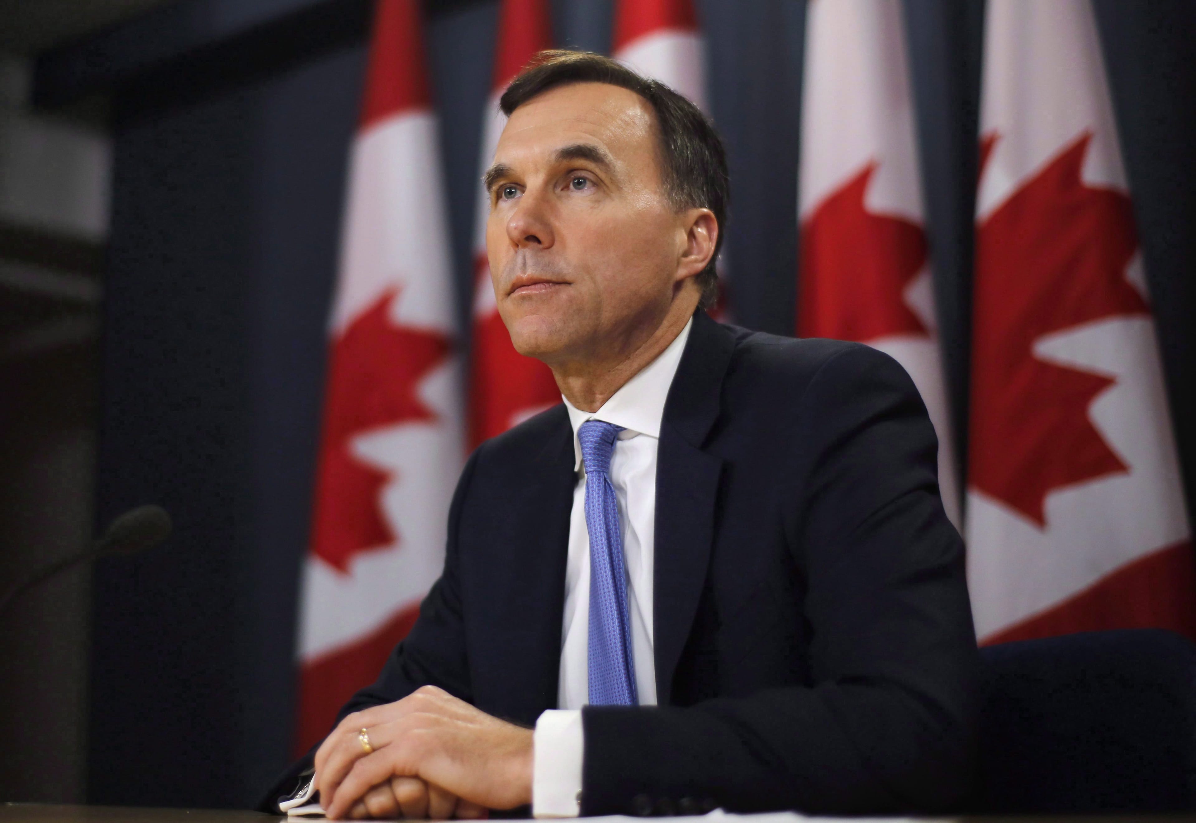 Finance Minister Bill Morneau speaks about the Trans Mountain Expansion project at a press conference in Ottawa on May 16, 2018. Finance Minister Bill Morneau expected to announce Tuesday morning where the government plans to go with Kinder Morgan to ensure the controversial Trans Mountain pipeline expansion gets built. (Patrick Doyle/The Canadian Press)