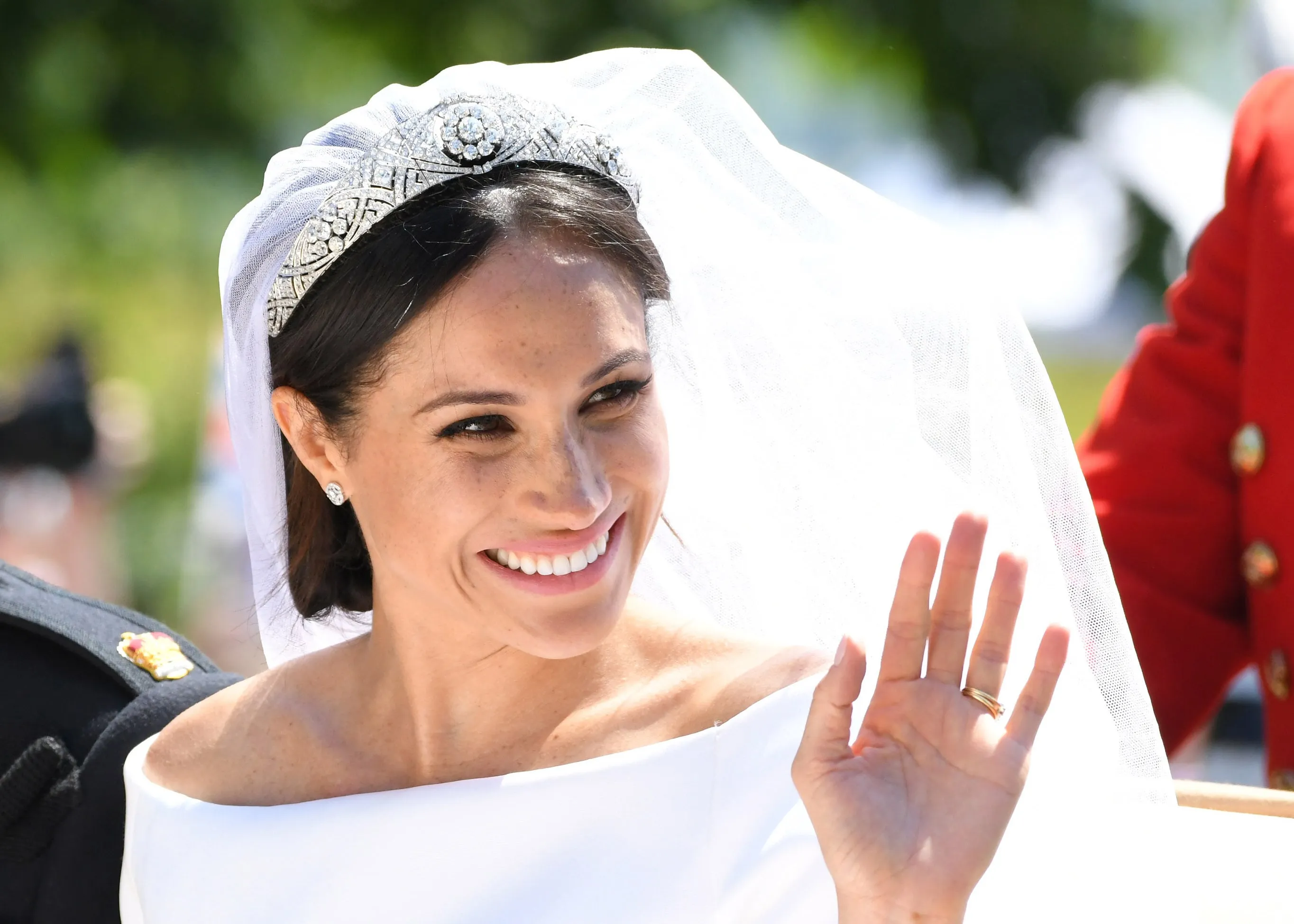 Meghan, Duchess of Sussex leaves Windsor Castle in the Ascot Landau carriage during a procession after getting married at St Georges Chapel on May 19, 2018 in Windsor, England. (Photo by Karwai Tang/WireImage)