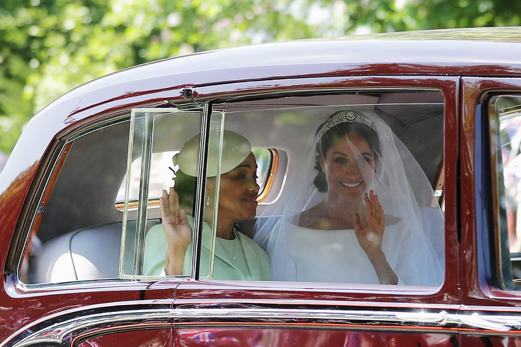 Meghan Markle (R) with her mother Doria Ragland drive down the Long Walk as they arrive at Windsor Castle ahead of her wedding to Prince Harry on May 19, 2018 in Windsor, England. (Richard Heathcote/Getty Images)