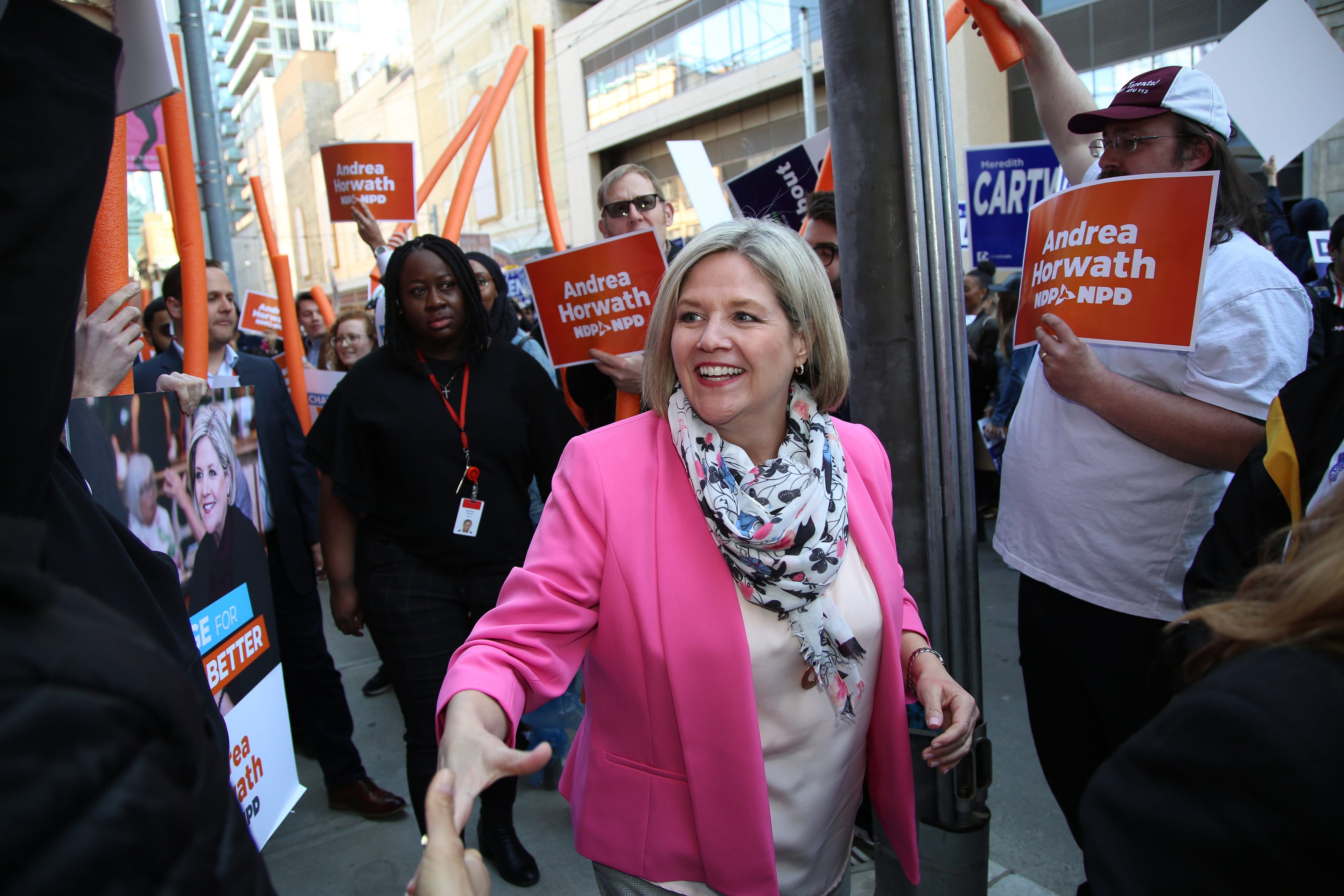 TORONTO, ON-Toronto-Debate Supporters. NDP Leader Andrea Horwath arrives at the debates while supporters of all parties wait for their leaders in front of City TV in Toronto at Yonge and Dundas (Rene Johnston/Toronto Star via Getty Images)