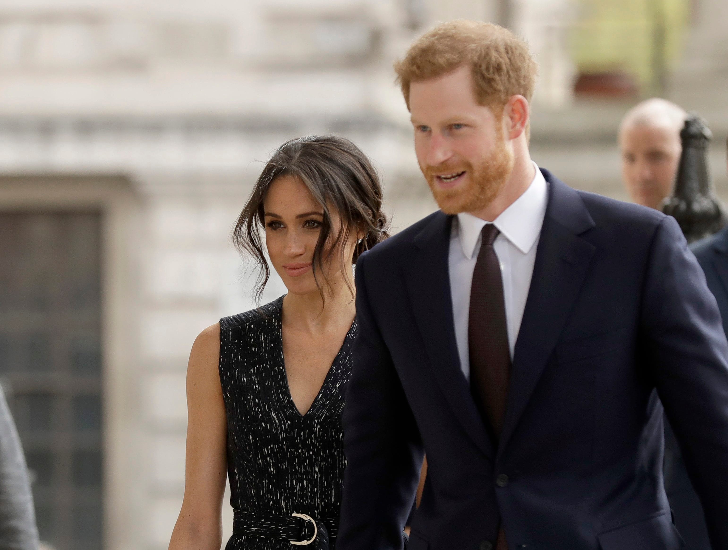 Prince Harry and his fiancee Meghan Markle (AP Photo/Matt Dunham)
