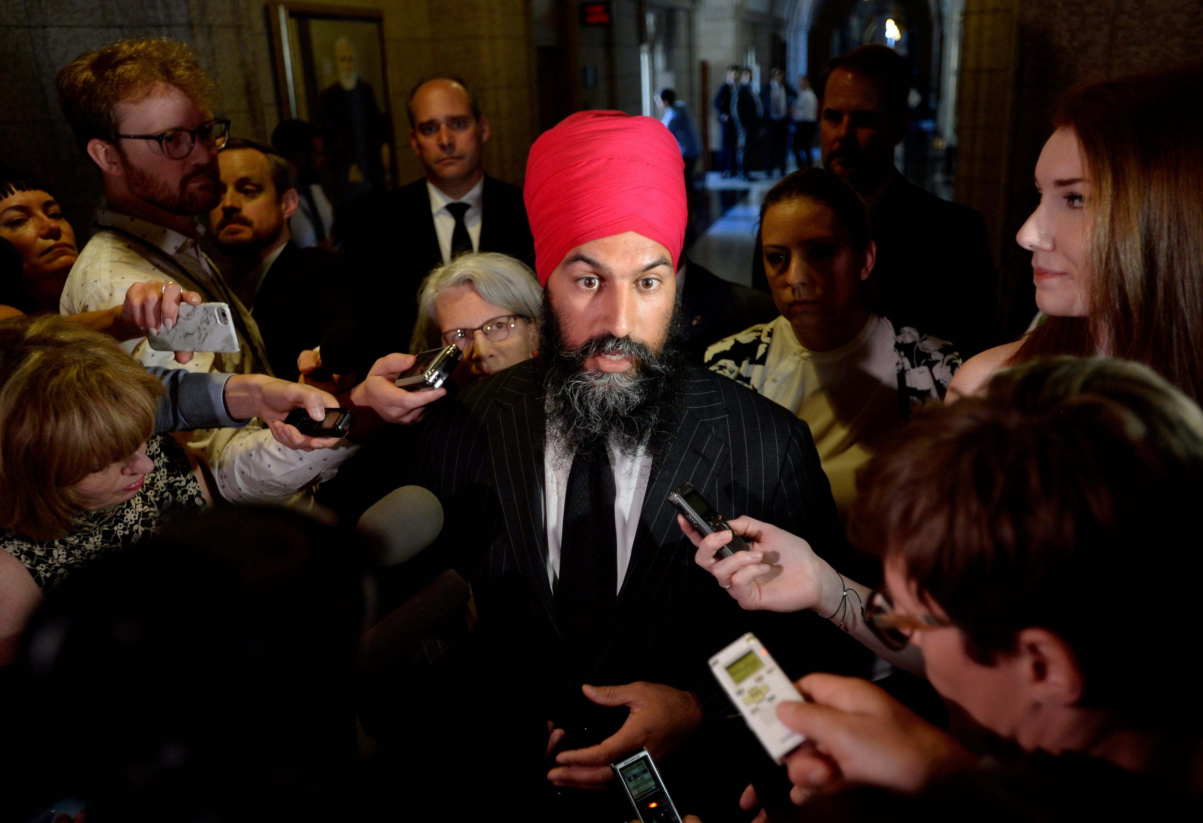NDP Leader Jagmeet Singh speaks to reporters in the in the foyer of the House of Commons on Parliament Hill in Ottawa on Tuesday, June 19, 2018. (THE CANADIAN PRESS/Justin Tang)