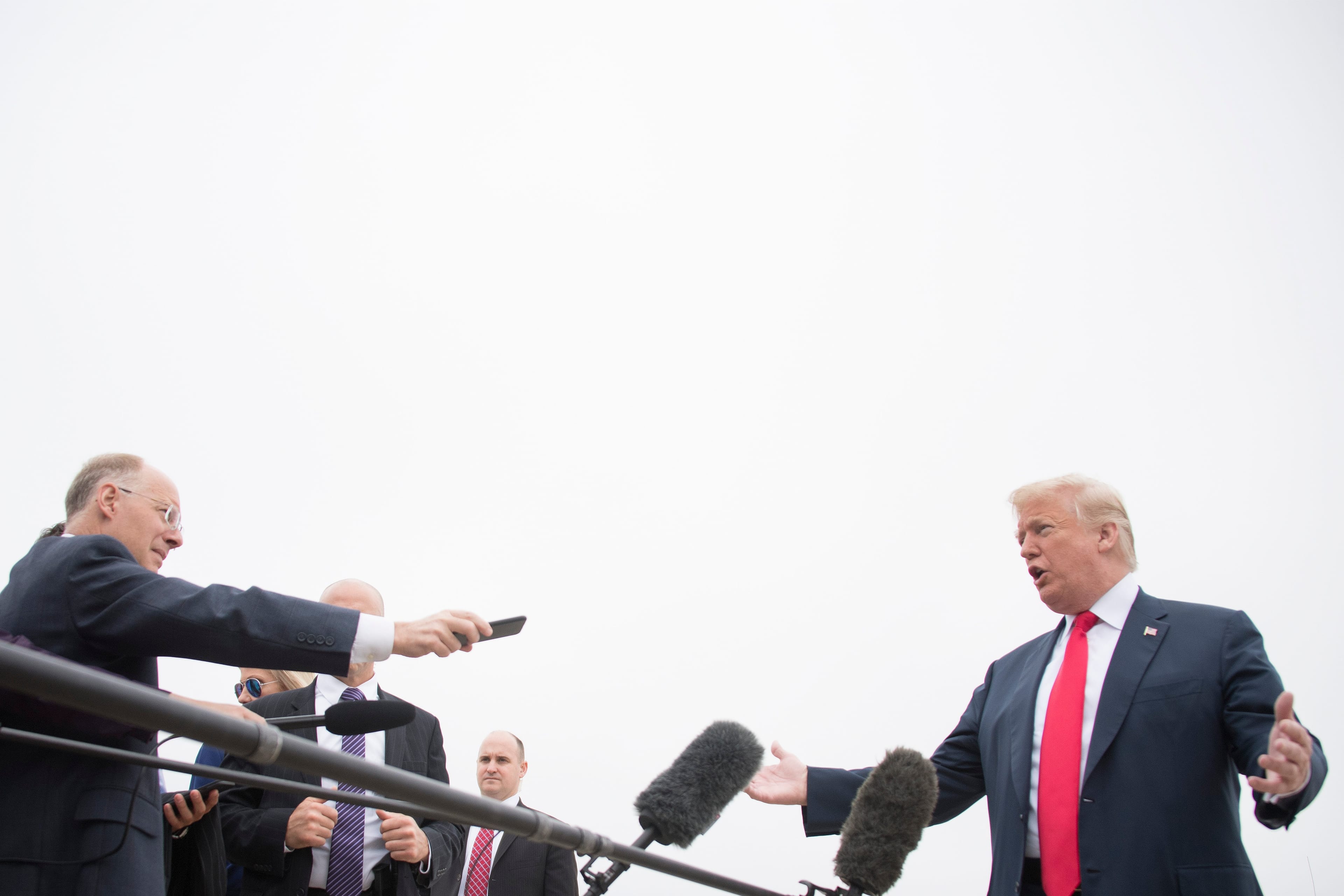 U.S. President Donald Trump talks to the press before boarding Air Force One at Andrews Air Force Base, Maryland, on May 31, 2018, as he travels to Texas for Republican fundraisers. (Jim Watson/AFP/Getty Images)