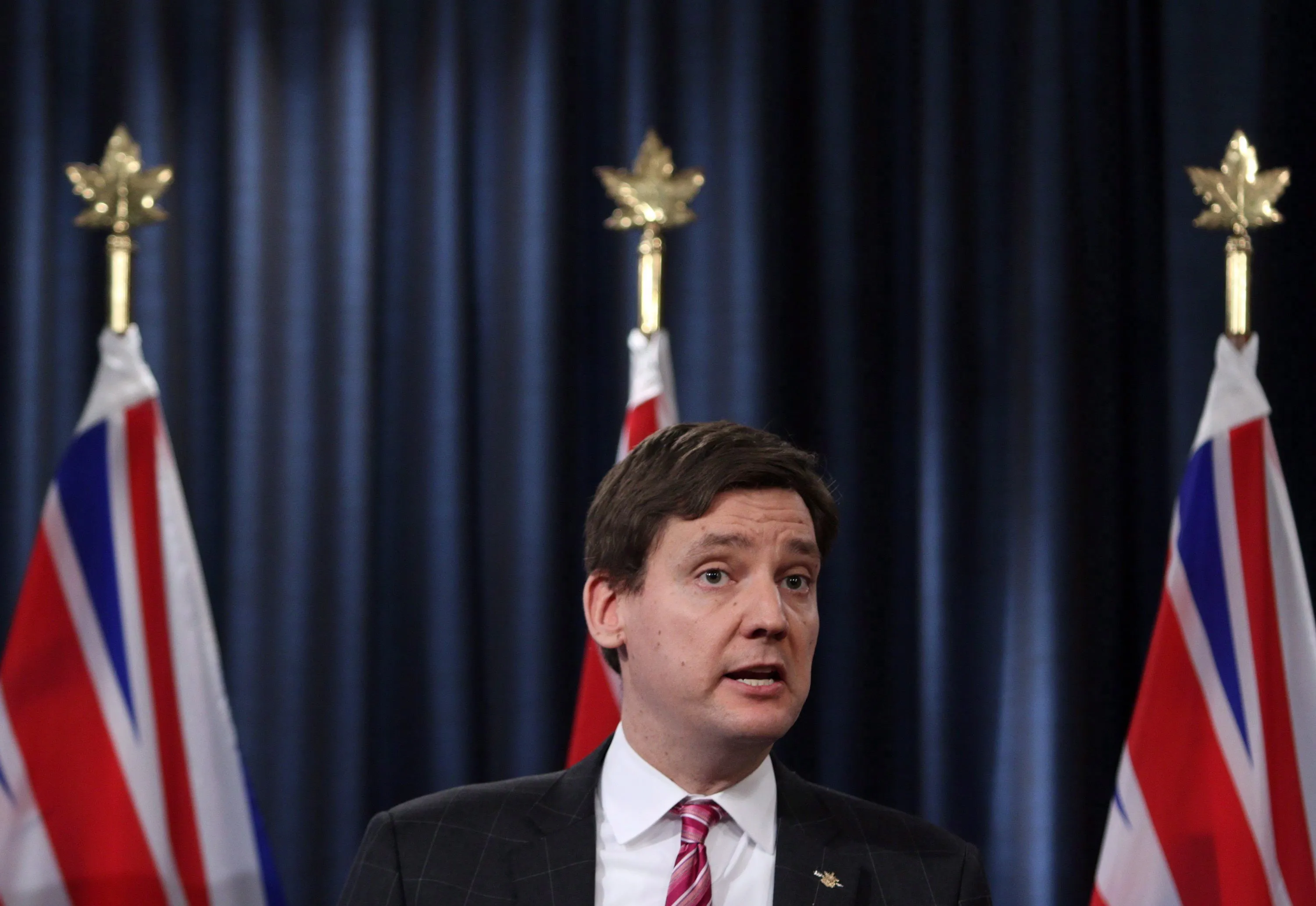 Attorney General David Eby answers questions from media about the changes coming to ICBC during a press conference in the press gallery at Legislature in Victoria, B.C., on Tuesday February 6, 2018. THE CANADIAN PRESS/Chad Hipolito