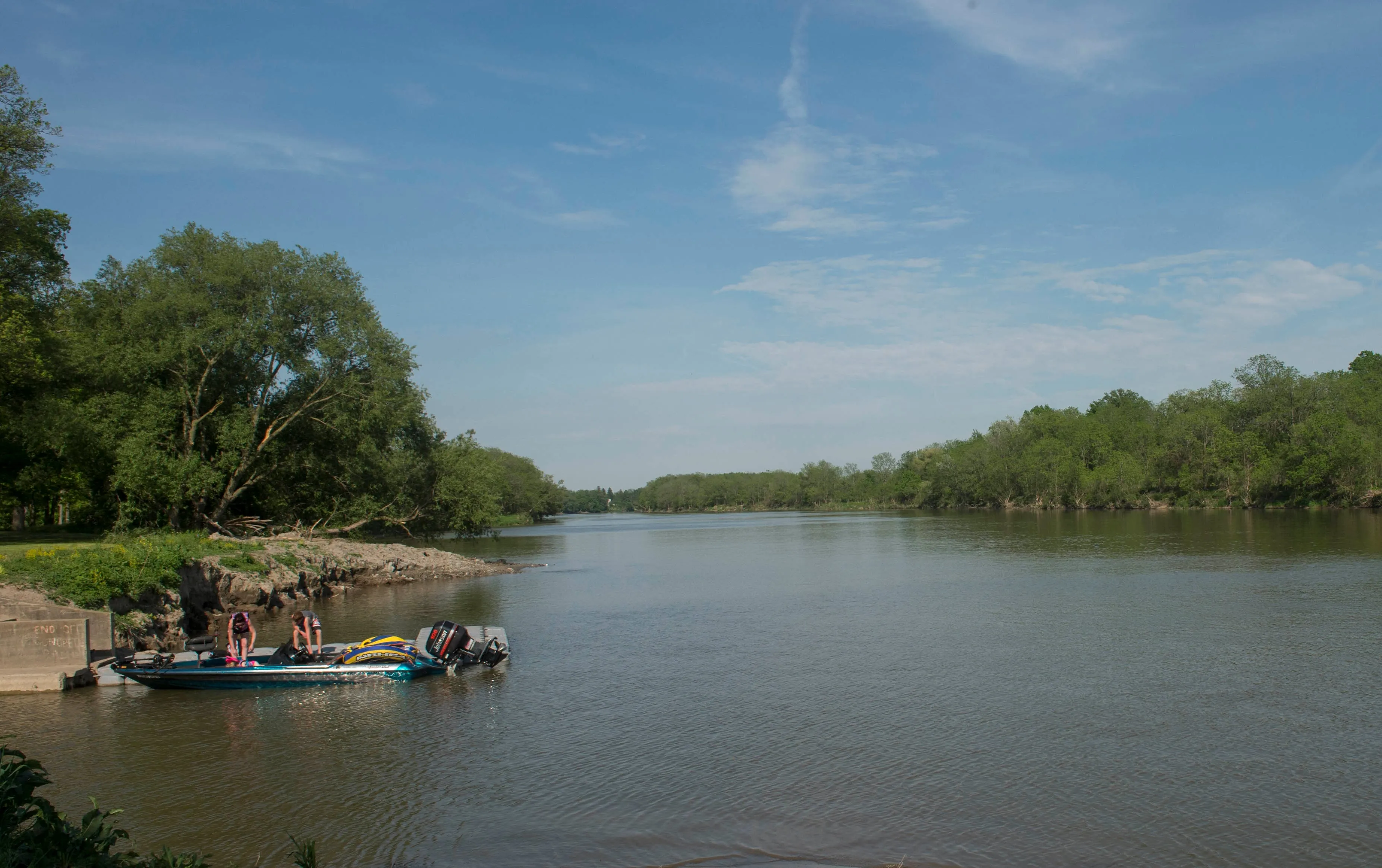 A family unloads their boat after a day of relaxing on the Grand River at Chiefswood Park next to the Chiefswood National Historic Site. The park contains 20 acres of lush nature. The Grand River has been given a Heritage River designation by the Canadian Heritage Rivers System that encourages the long-term management to conserve the natural, cultural and recreational values of rivers in Canada. (Photograph by Andrew Lahodynskyj)