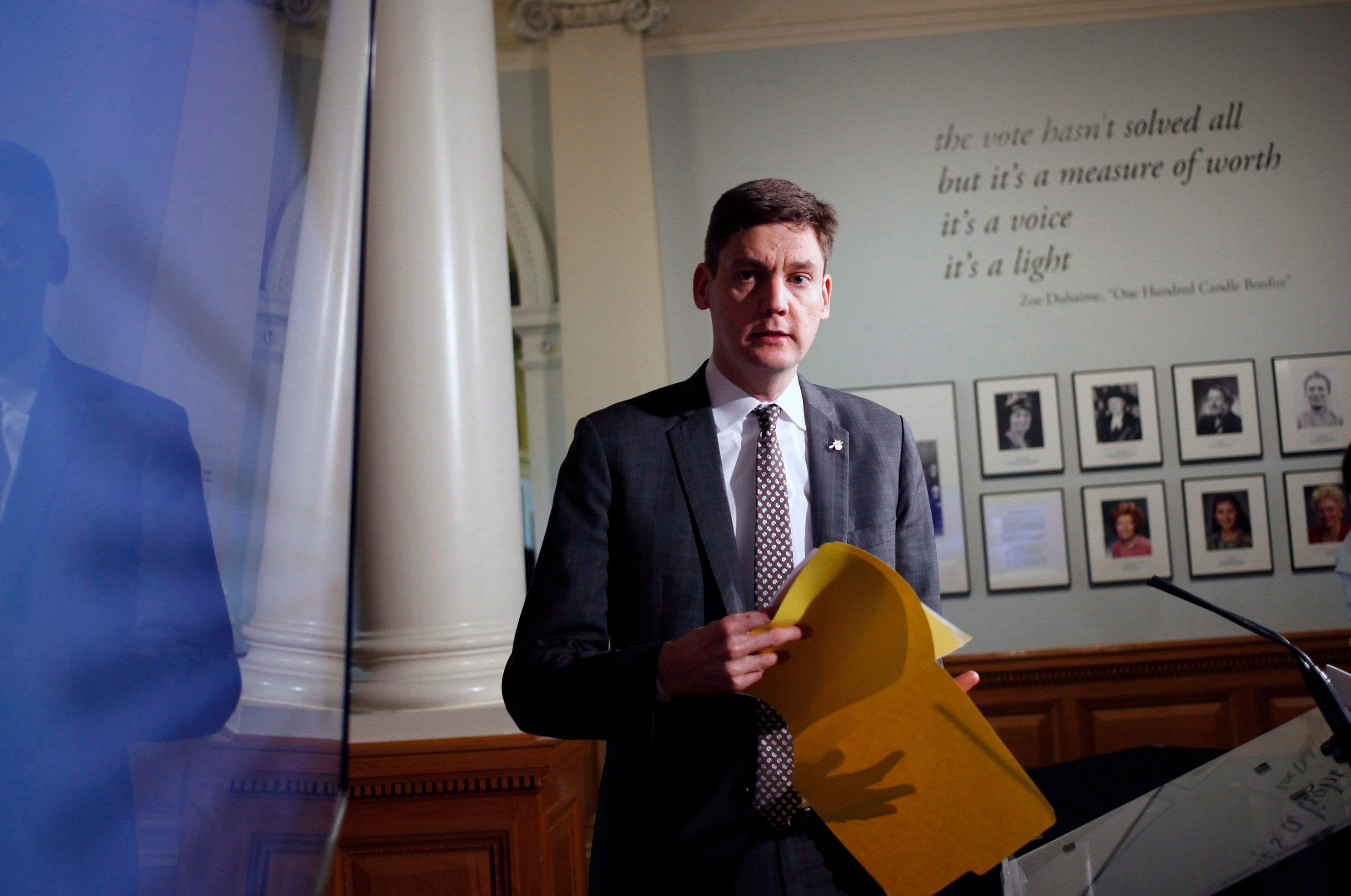 Eby arrives to speak to media about a provincial referendum on electoral reform, one of numerous hot-button issues on his desk (Chad Hipolito/CP)