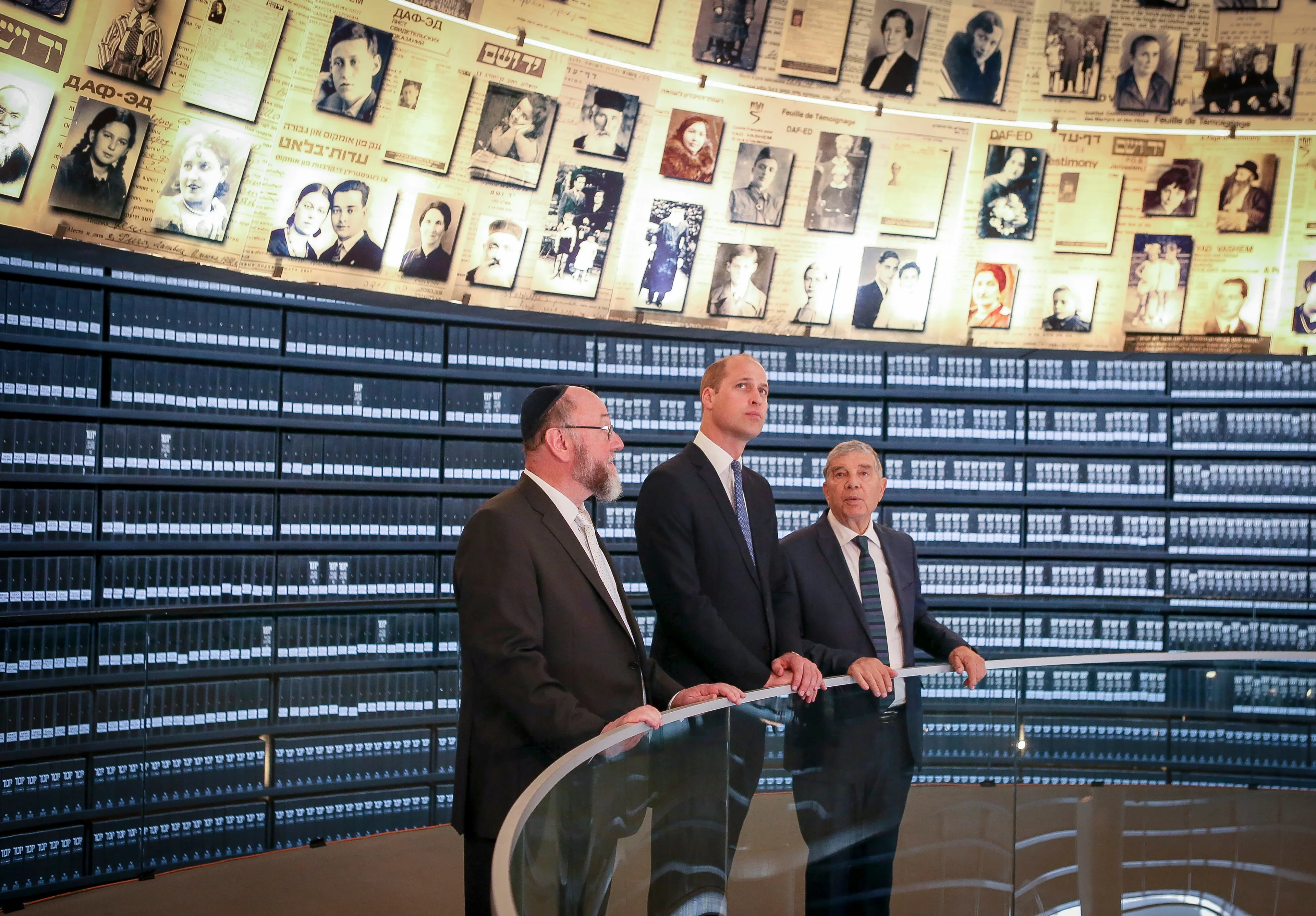 Prince William, Duke of Cambridge, visits the Hall of Names with the UK's Chief Rabbi Ephraim Mirvis (left) at Yad Vashem Holocaust Memorial and Museum during his official tour of Jordan, Israel and the Occupied Palestinian Territories on June 26, 2018 in Jerusalem, Israel. (Ian Vogler/Pool/Getty Images)