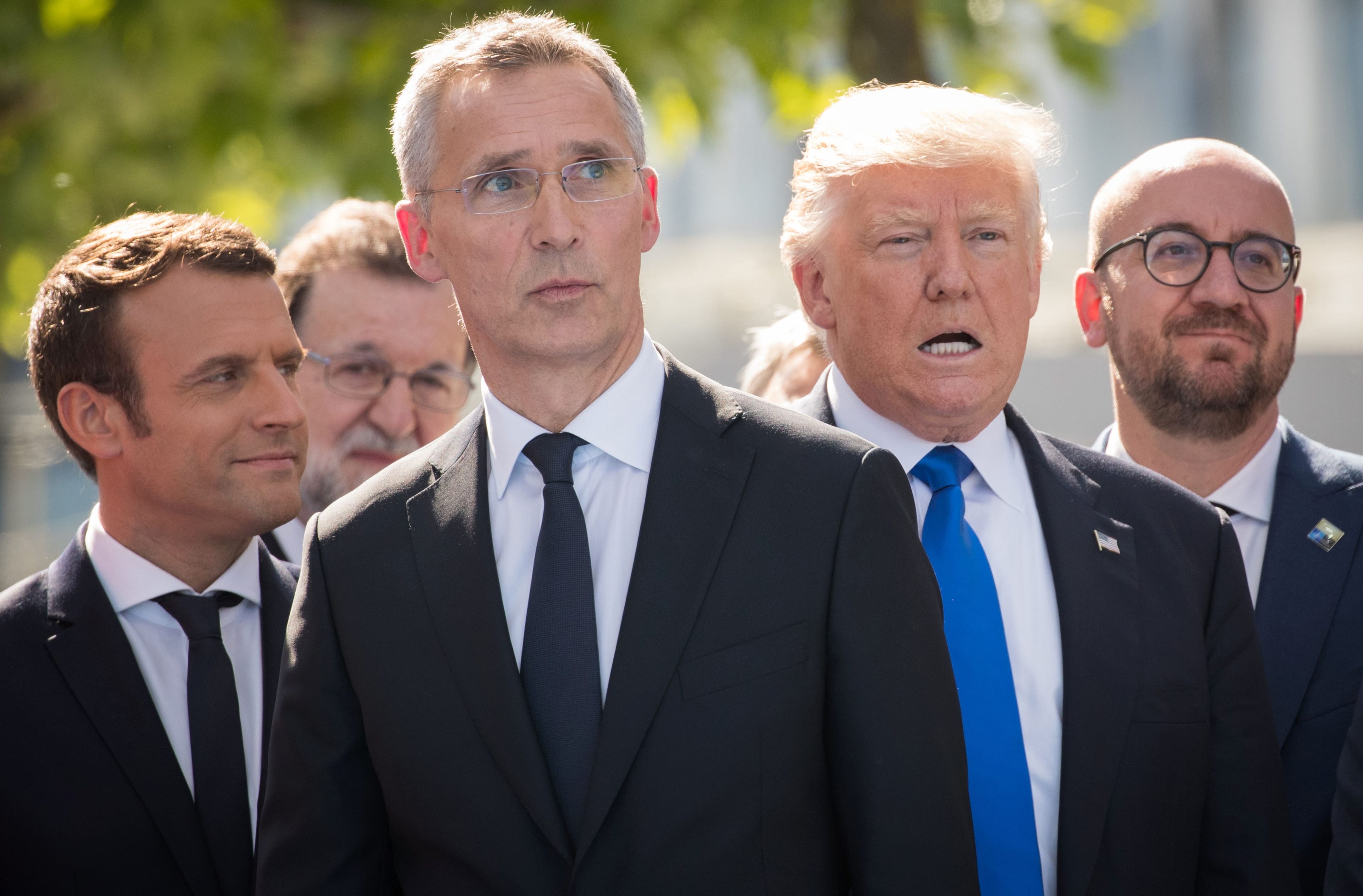 (from left) French President Emmanuel Macron, NATO Secretary General Jens Stoltenberg, U.S. President Donald Trump and Belgian Prime Minister Charles Michel look on during the unveiling ceremony of the new headquarters of NATO on May 25, 2017, in Brussels (BENOIT DOPPAGNE/AFP/Getty Images)
