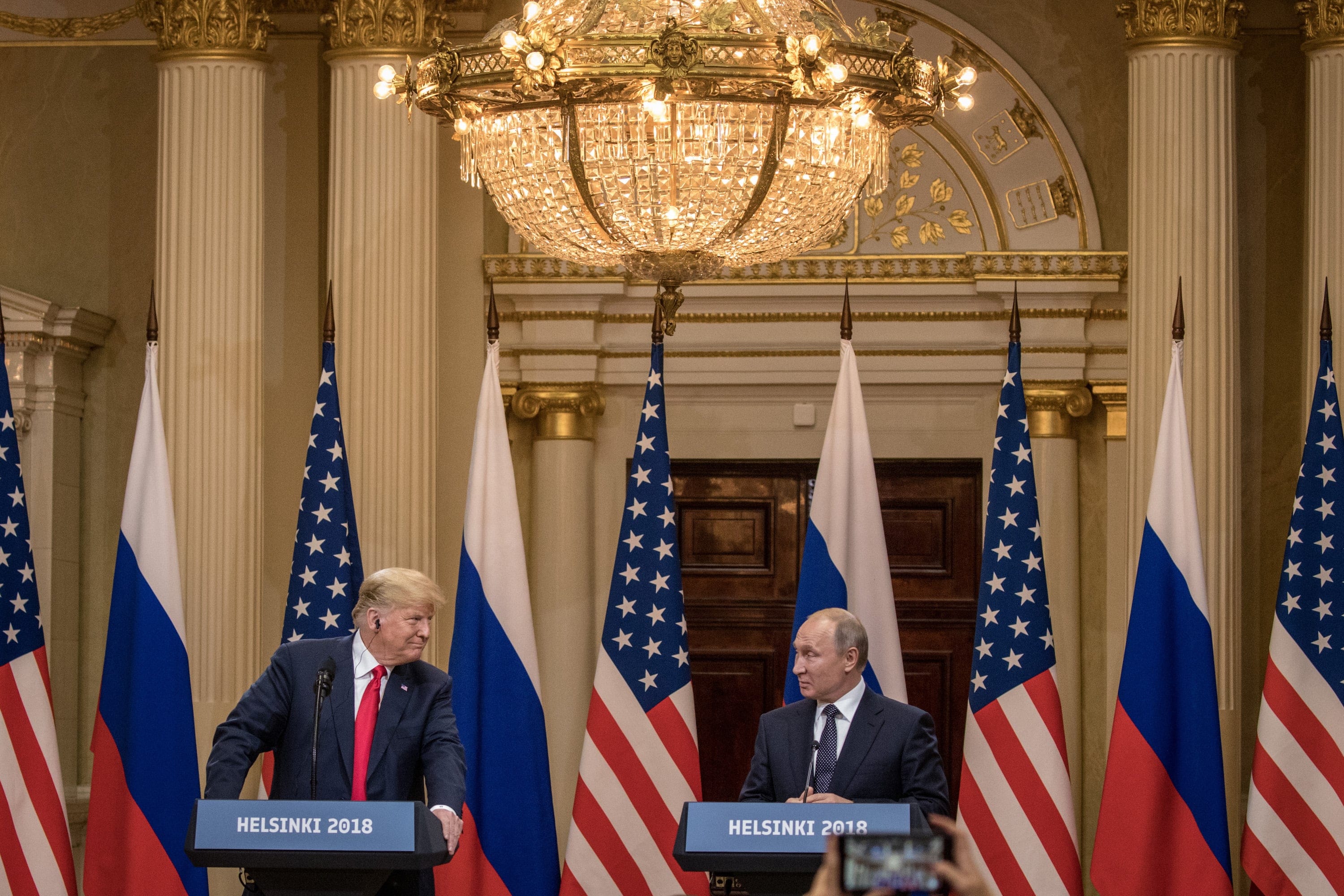 HELSINKI, FINLAND - JULY 16: U.S. President Donald Trump (L) and Russian President Vladimir Putin speak to the media during a joint press conference after their summit on July 16, 2018 in Helsinki, Finland. The two leaders met one-on-one and discussed a range of issues including the 2016 U.S Election collusion. (Photo by Chris McGrath/Getty Images)