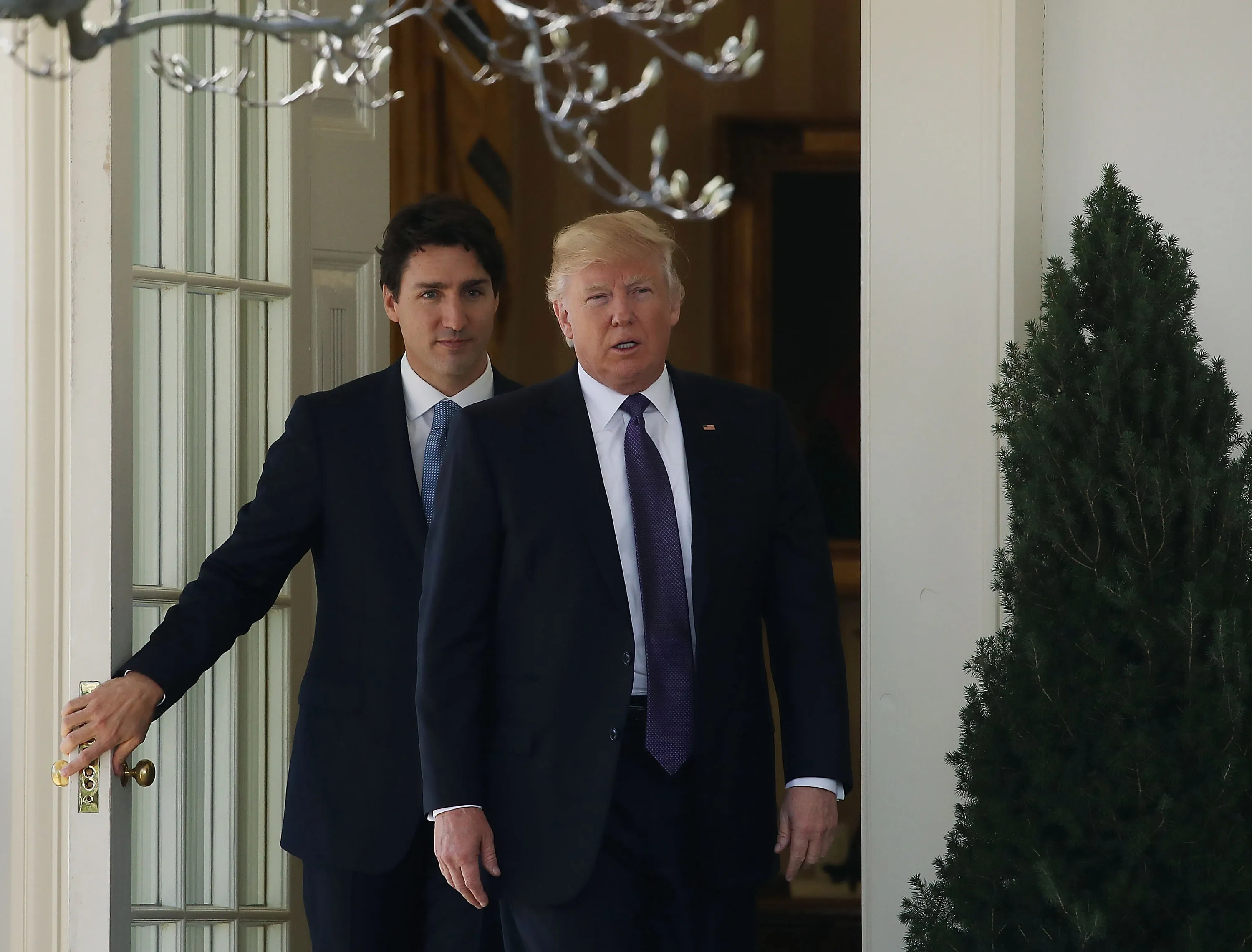 U.S. President Donald Trump walks with Canadian Prime Minister Justin Trudeau after a meeting at the White House on February 13, 2017 in Washington, DC. (Mark Wilson/Getty Images)