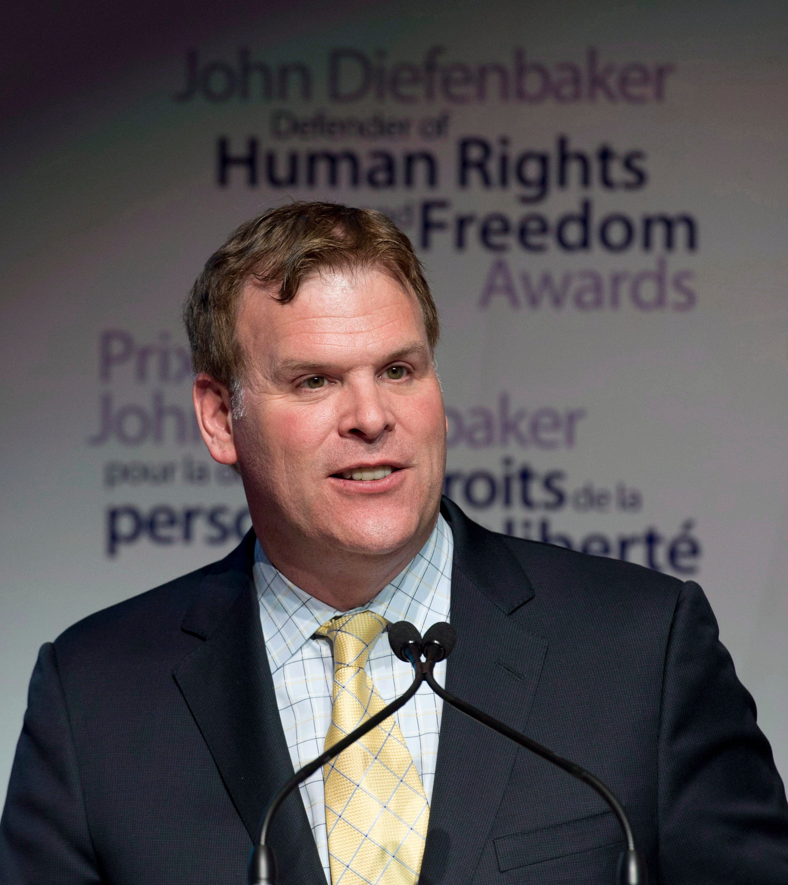 John Baird speaks before presenting the John Diefenbaker Defender of Human Rights and Freedoms award in Ottawa on Tuesday, Nov. 18, 2014. (THE CANADIAN PRESS/Adrian Wyld)