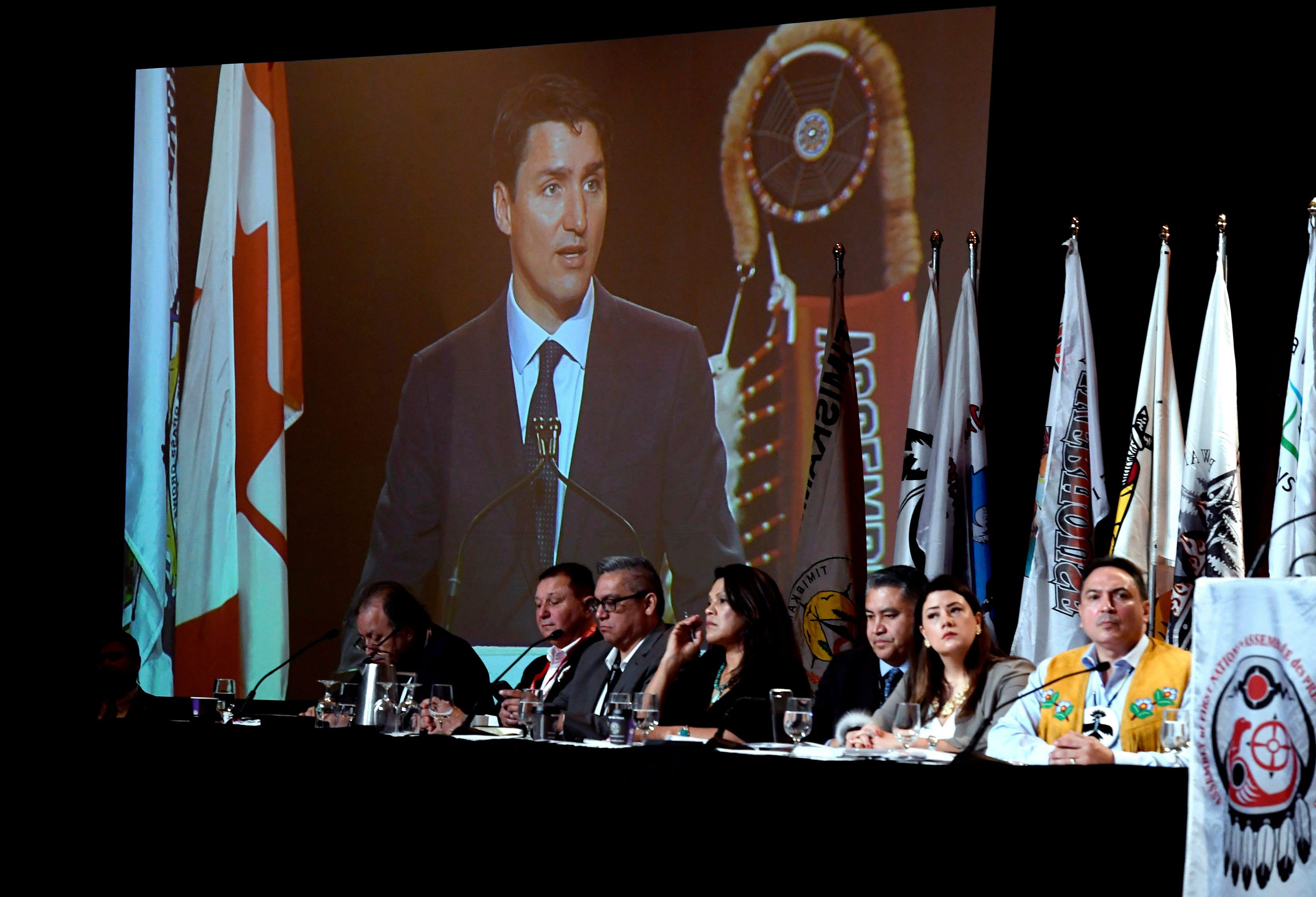 Trudeau, seen on a screen behind, delivers an address on May 2 at the Assembly of First Nations Special Chiefs Assembly, in Gatineau, Que. THE CANADIAN PRESS/Justin Tang