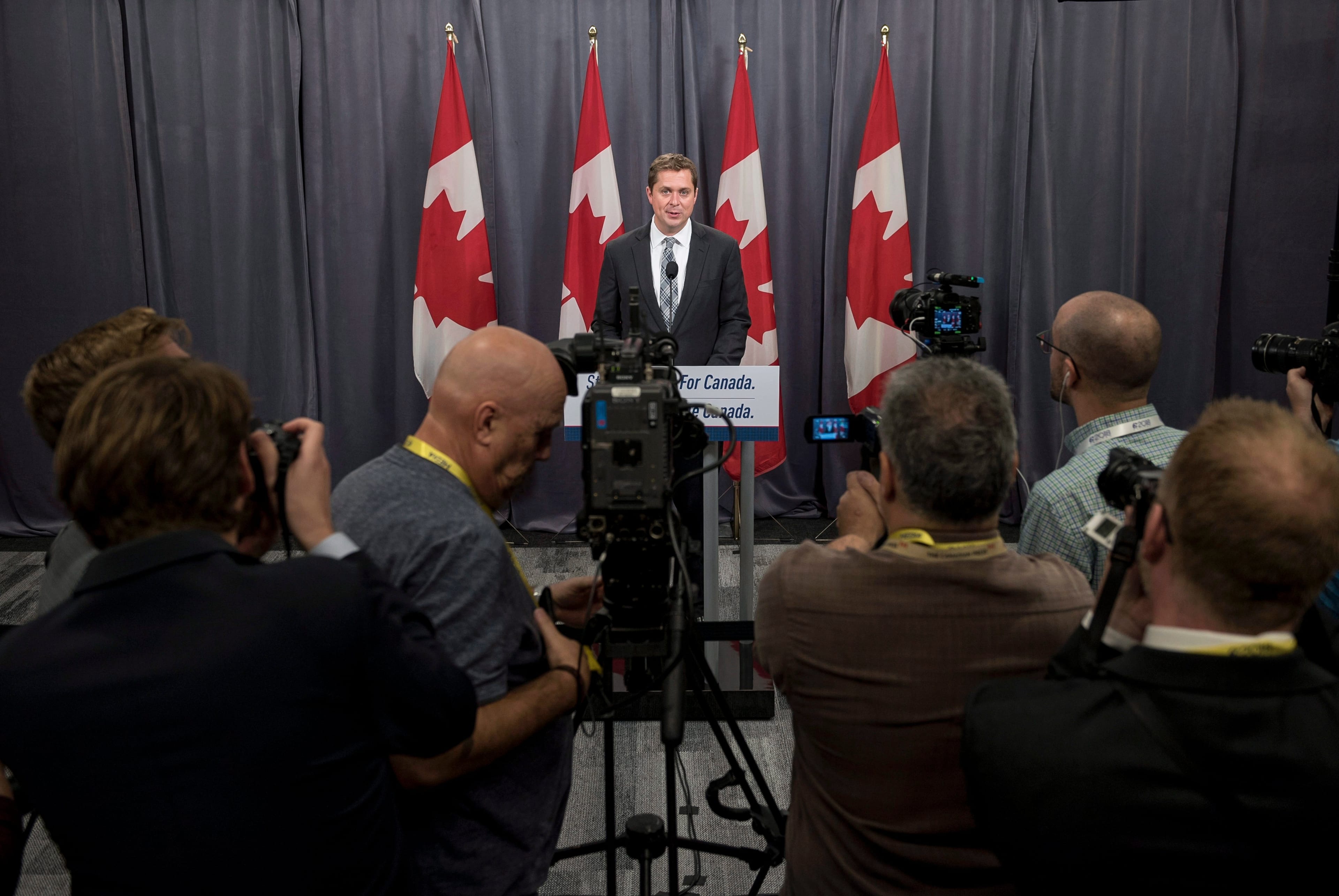 Conservative leader Andrew Scheer speaks to reporters Thursday at the party's national convention in Halifax THE CANADIAN PRESS/Darren Calabrese