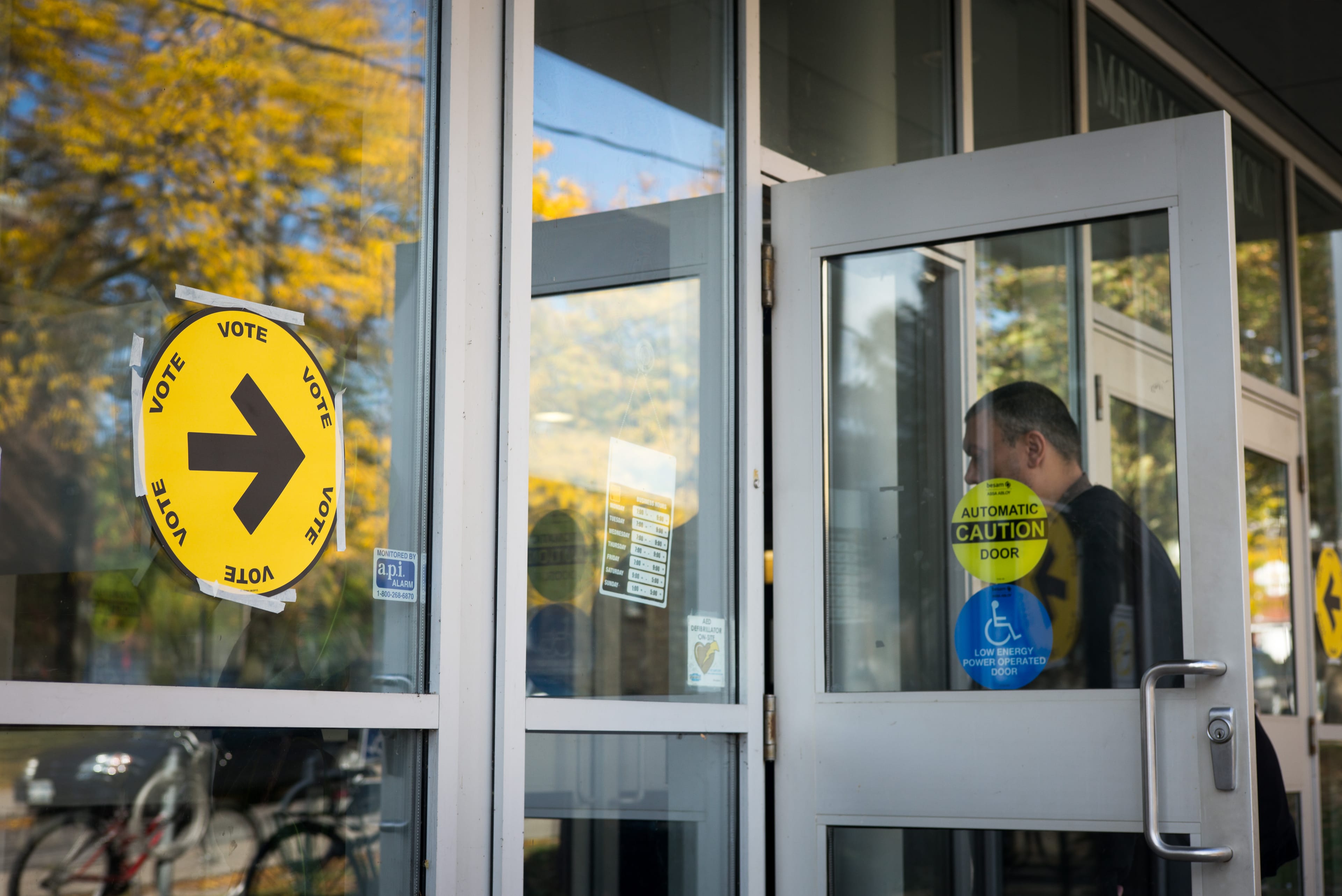 Voters make their way in and out of the polling station at the Mary McCormick Recreation Centre, in Toronto's Davenport riding, during the 42nd Canadian general election October 19, 2015 in Toronto. (Ian Willms/Getty Images)