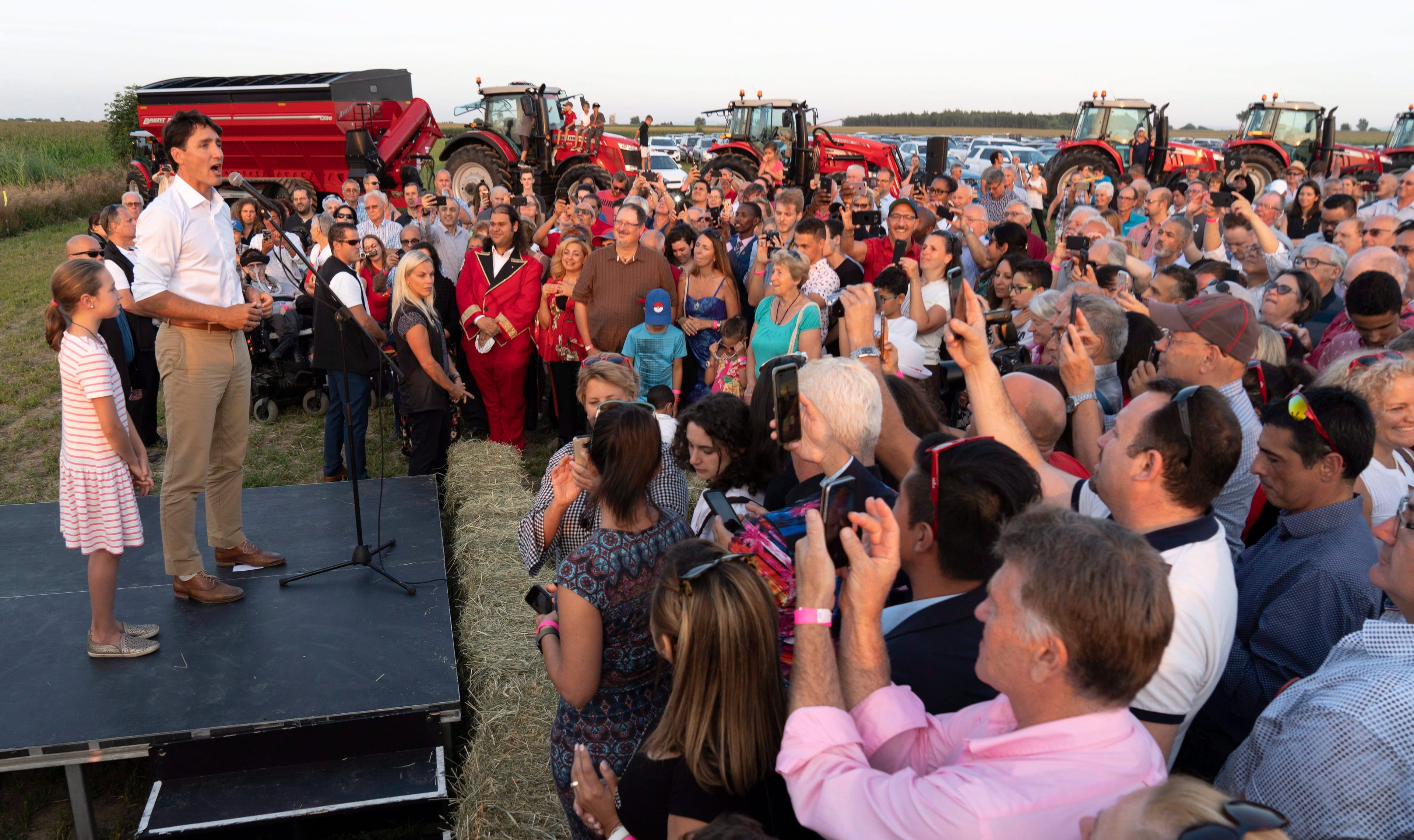 Prime Minister Justin Trudeau addresses local Liberals and Liberal MPs from the South Shore of Montreal for a summer corn roast in Sabrevois, Que., on Thursday, August 16, 2018. THE CANADIAN PRESS/Paul Chiasson