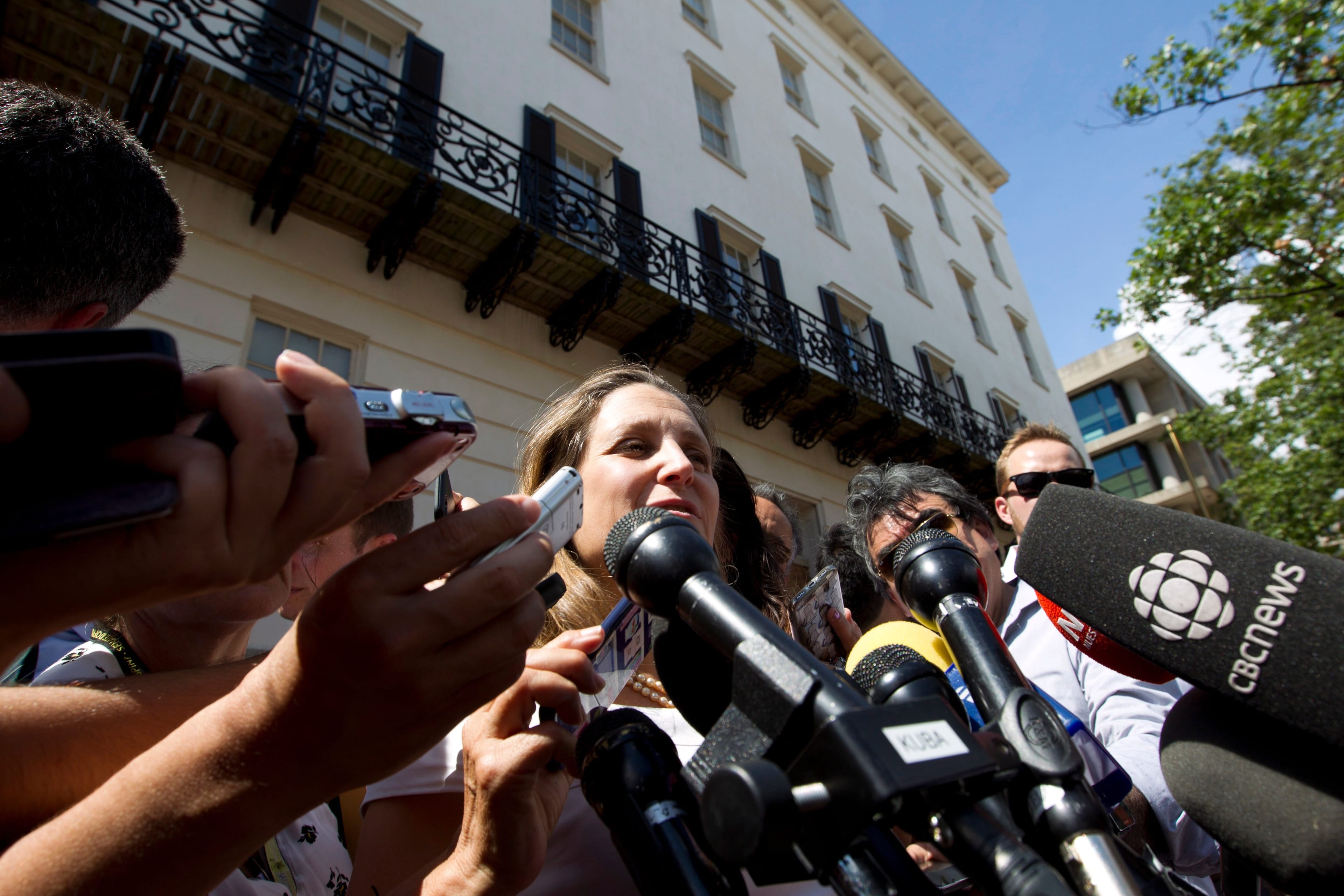 Canada's Foreign Affairs Minister Chrystia Freeland speaks with the media as she arrives for trade talks at the Office of the United States Trade Representative, Friday, Aug. 31, 2018, in Washington. (AP Photo/Jose Luis Magana)