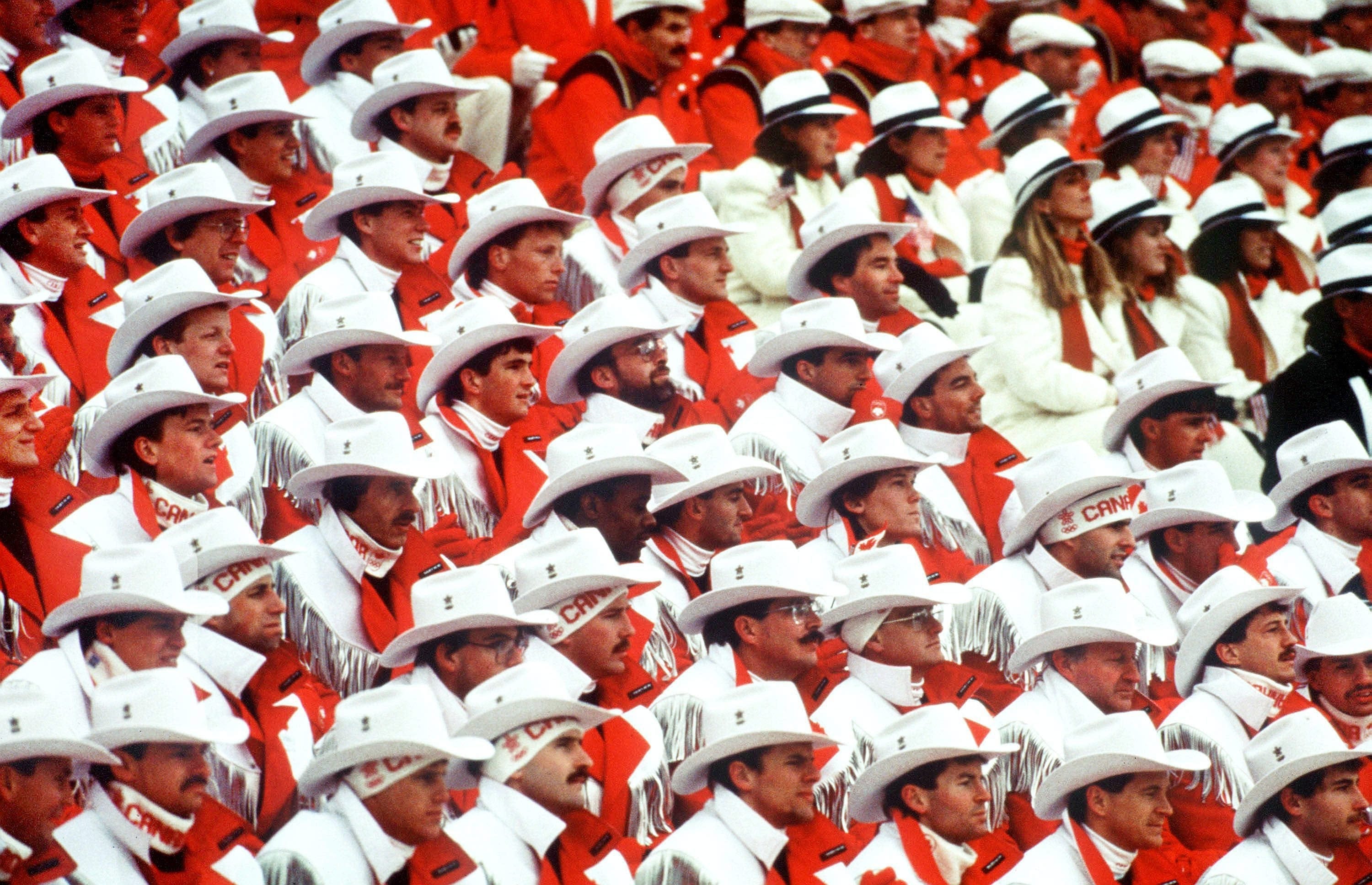 Canada's olympic athletes participating in the opening ceremonies at the 1988 Winter Olympics in Calgary. (CP PHOTO/COC/ Ted Grant)
Les athletes olympique lors des cérémonies d'ouverture des Jeux olympiques d' hiver de Calgary de 1988. (PC Photo/AOC/Ted Grant)