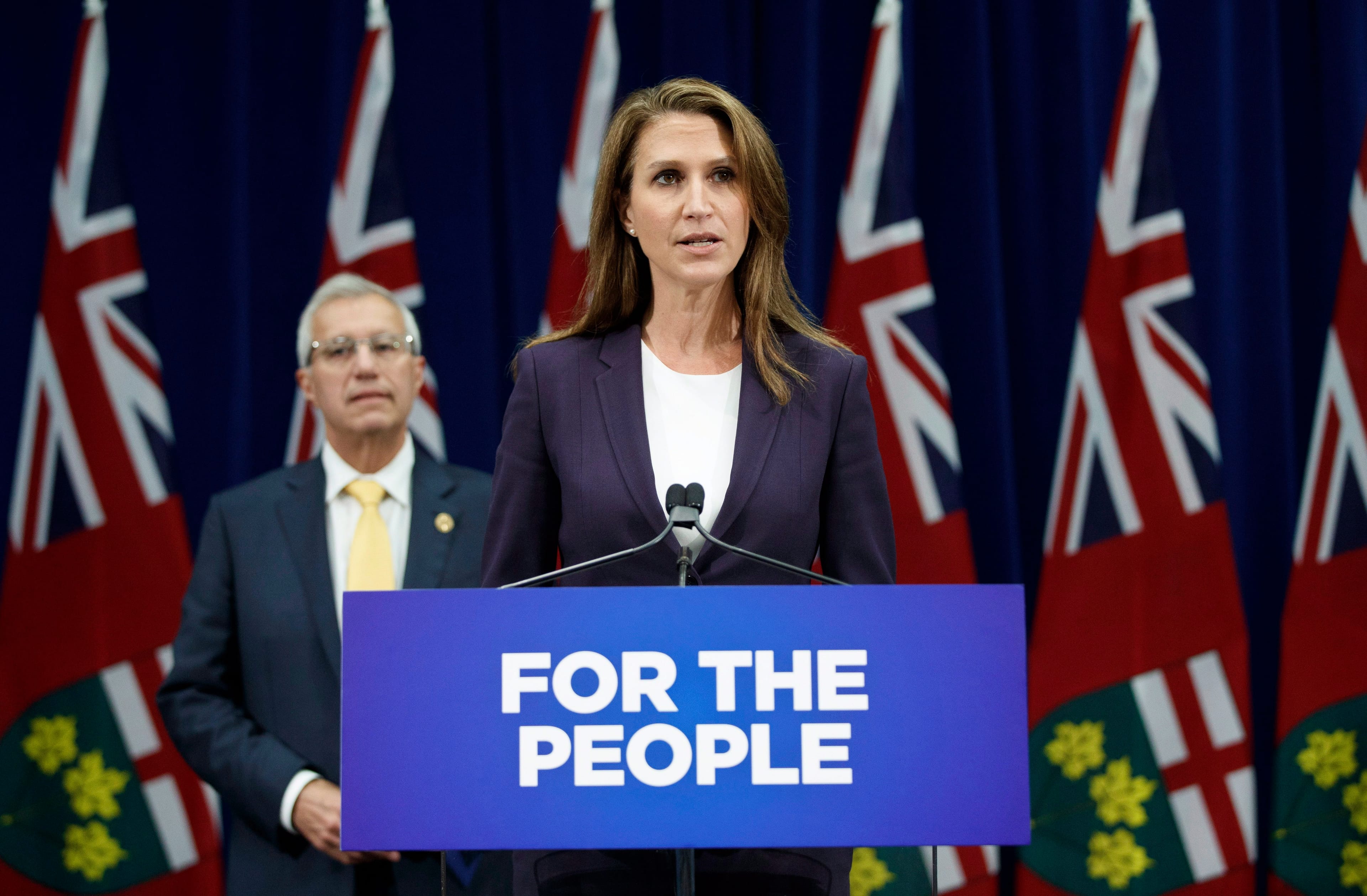 Ontario's Attorney General Caroline Mulroney and Minister of Finance Vic Fedeli speak about new legislation for selling marijuana, in Toronto, Wednesday September 26, 2018. THE CANADIAN PRESS/Mark Blinch
