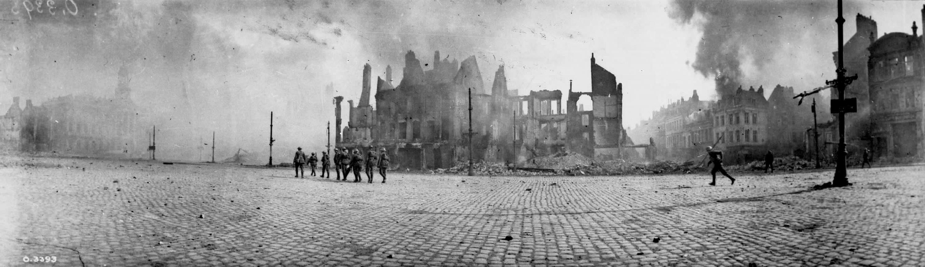 Canadians entering the square in Cambrai, France, with three sides of it on fire, in October 1918 (William Rider-Rider/Atlas Photo Archive/Alamy)