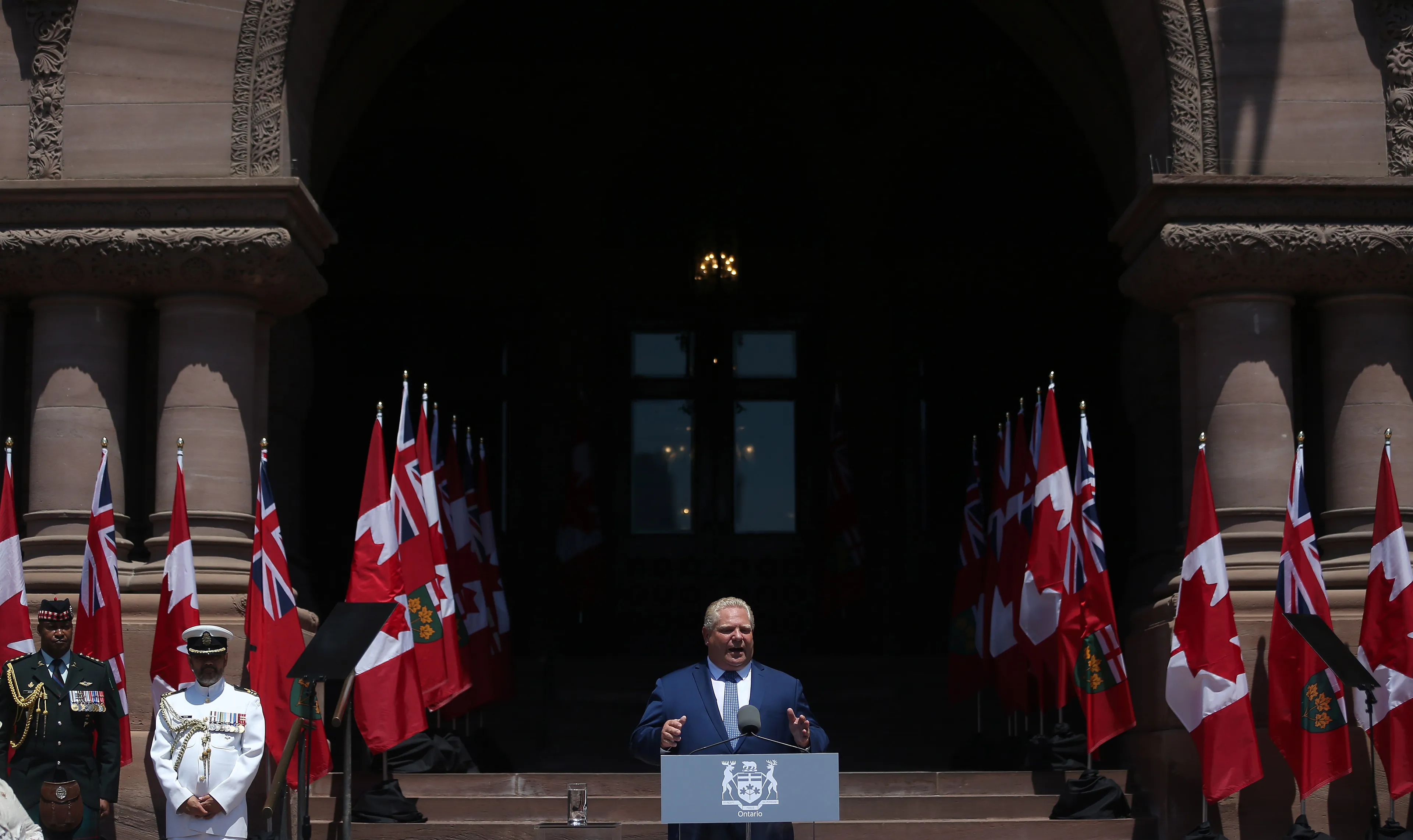 Doug Ford makes a speech as he performs a ceremonial swearing in outside. (Steve Russell/Toronto Star/Getty Images)